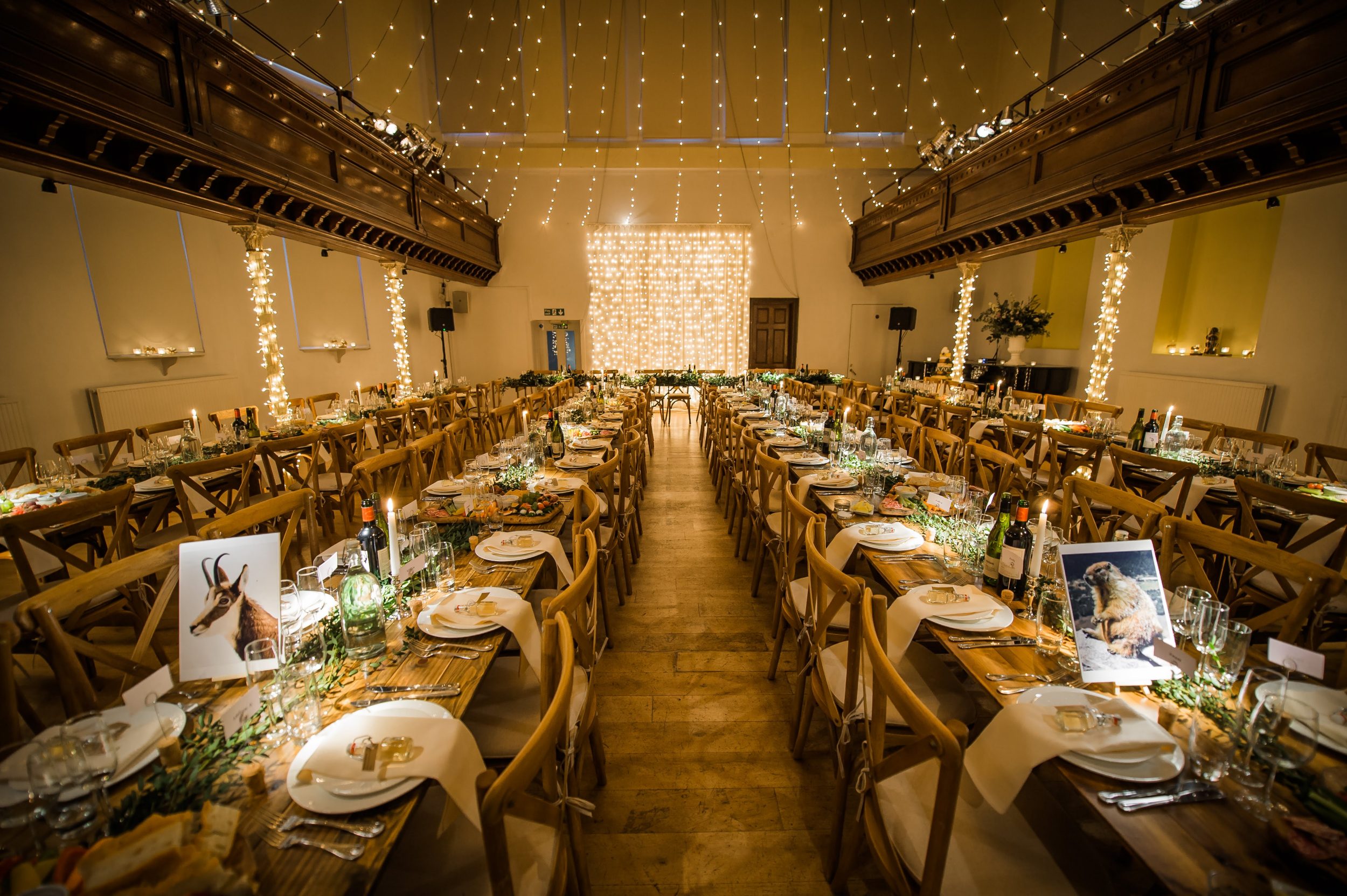 Elegant banquet hall with fine china, ideal for weddings and upscale events.