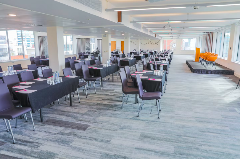 Conference setup in Etc.venues Manchester with natural light and professional ambiance.
