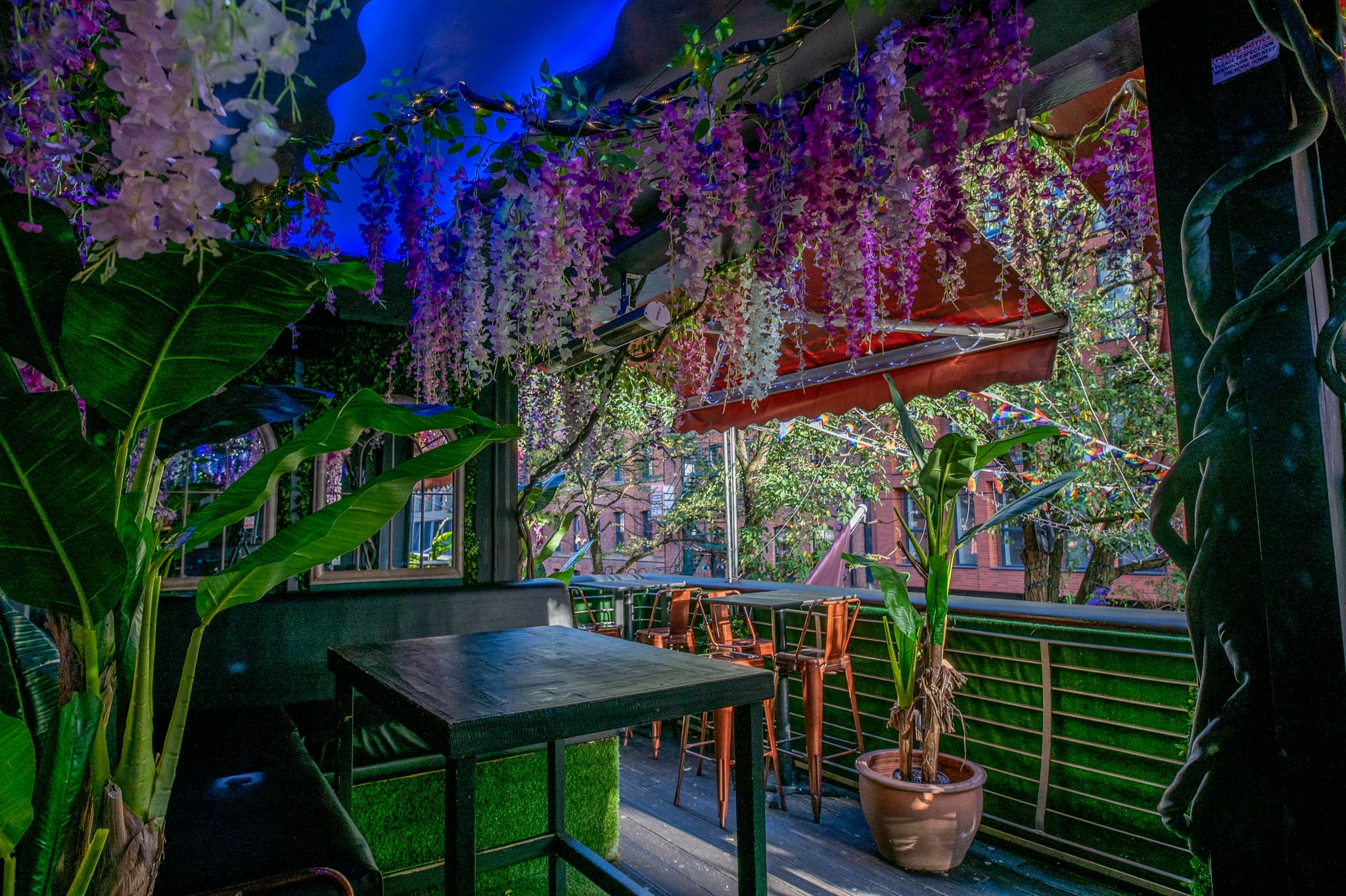 Vibrant ONBAR Manchester event space with floral decor, perfect for gatherings and social events.