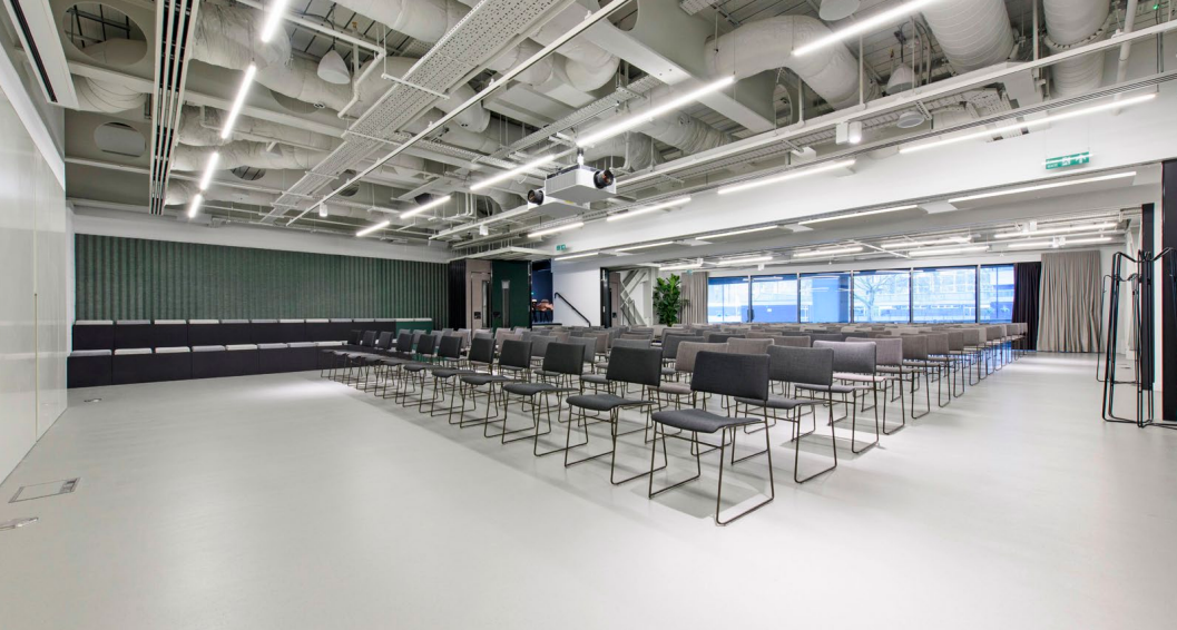 Modern event space with minimalist chairs for presentations and seminars.