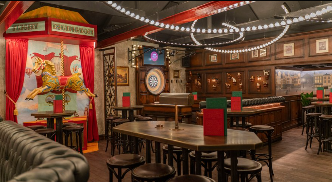 Vibrant event space at Flight Club Islington with vintage decor for team-building events.
