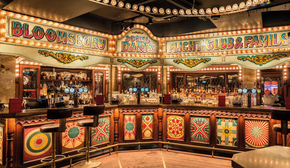 Vibrant bar setup at Flight Club Islington, perfect for events and gatherings.