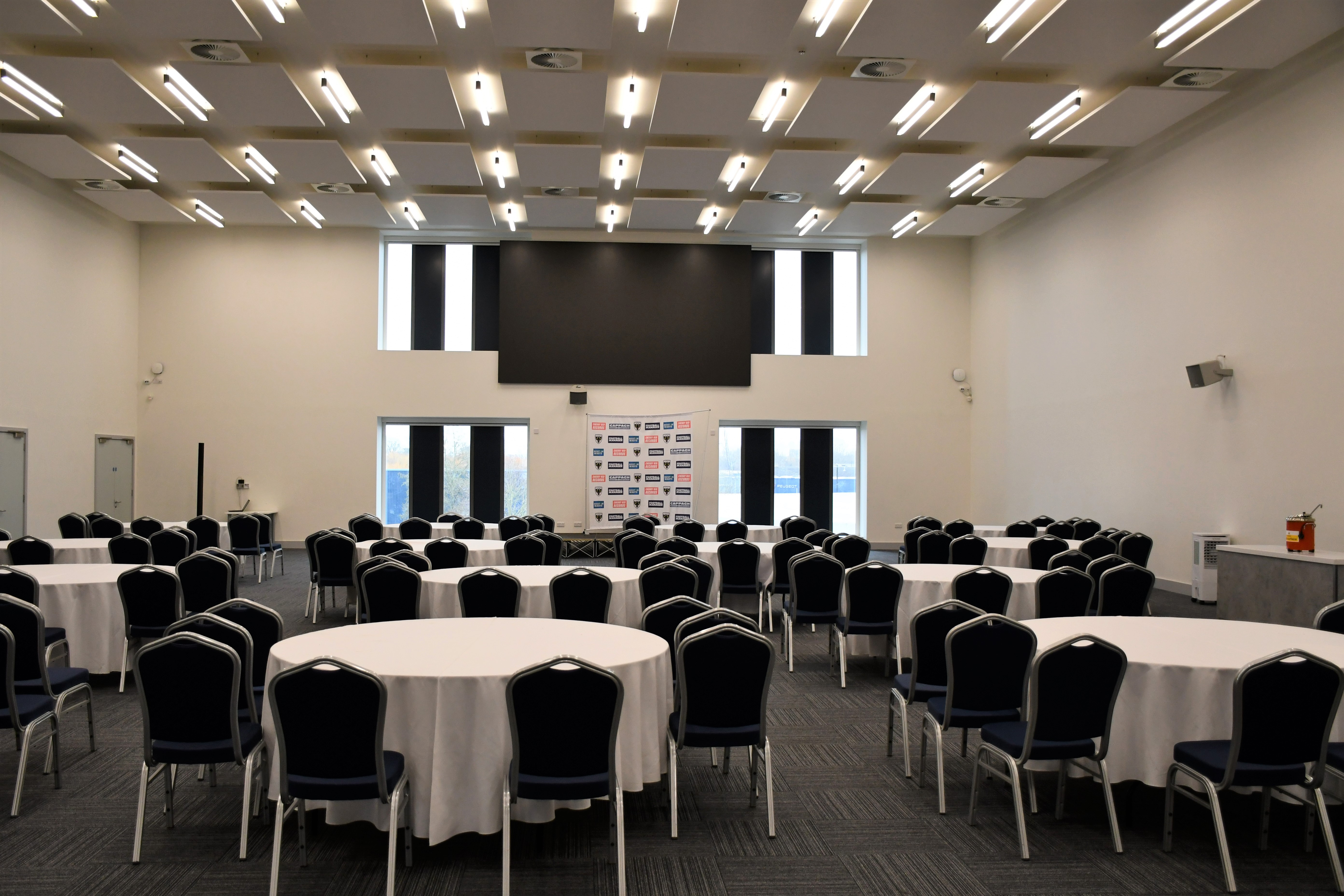 Spacious Silver Lounge venue in AFC Wimbledon set for a banquet or conference.