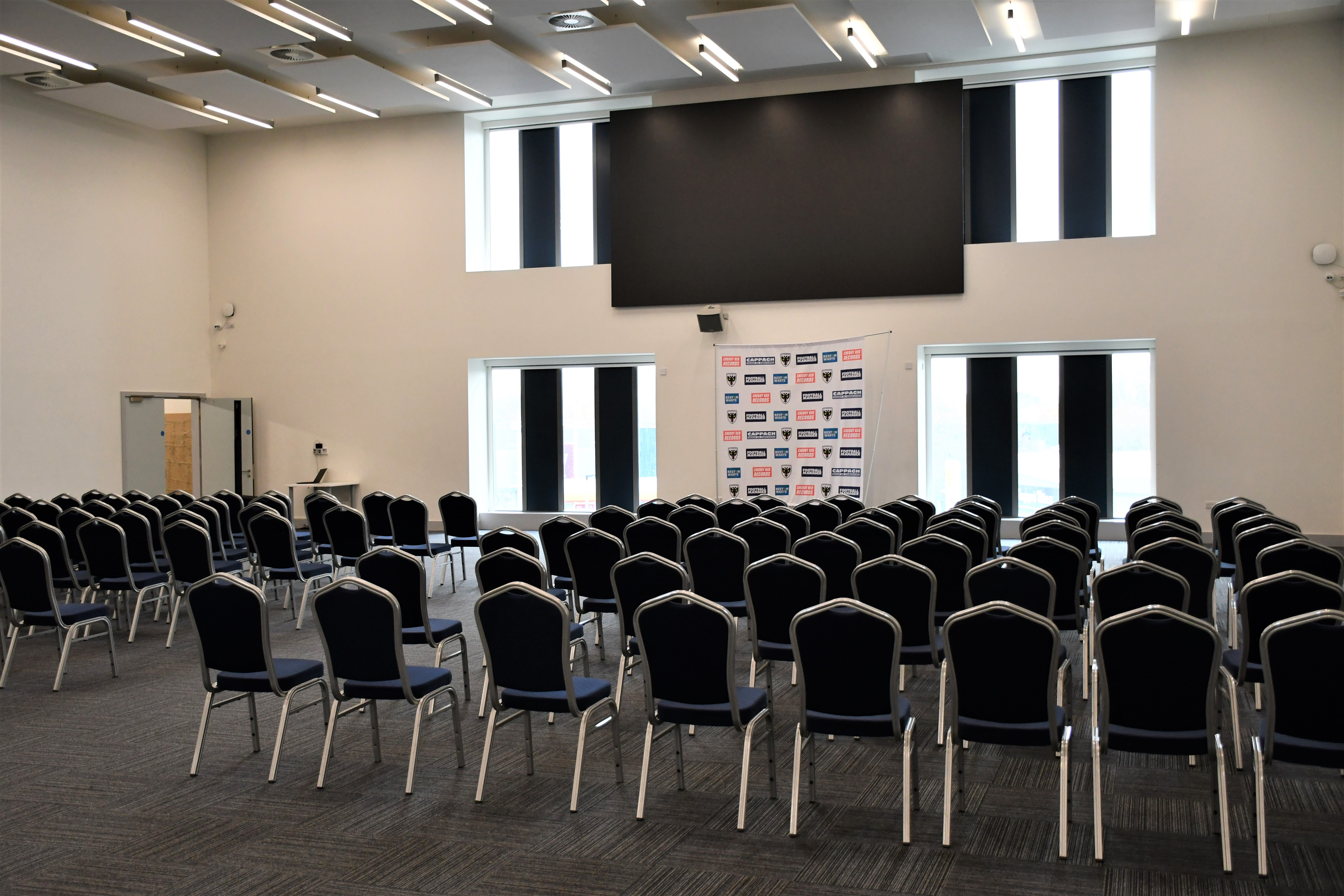 Silver Lounge at AFC Wimbledon, event space with chairs for corporate meetings and conferences.