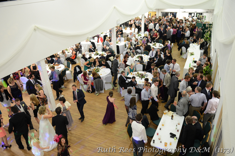 Royal Welsh Showground Members Centre bustling event with elegantly set tables and lively atmosphere.