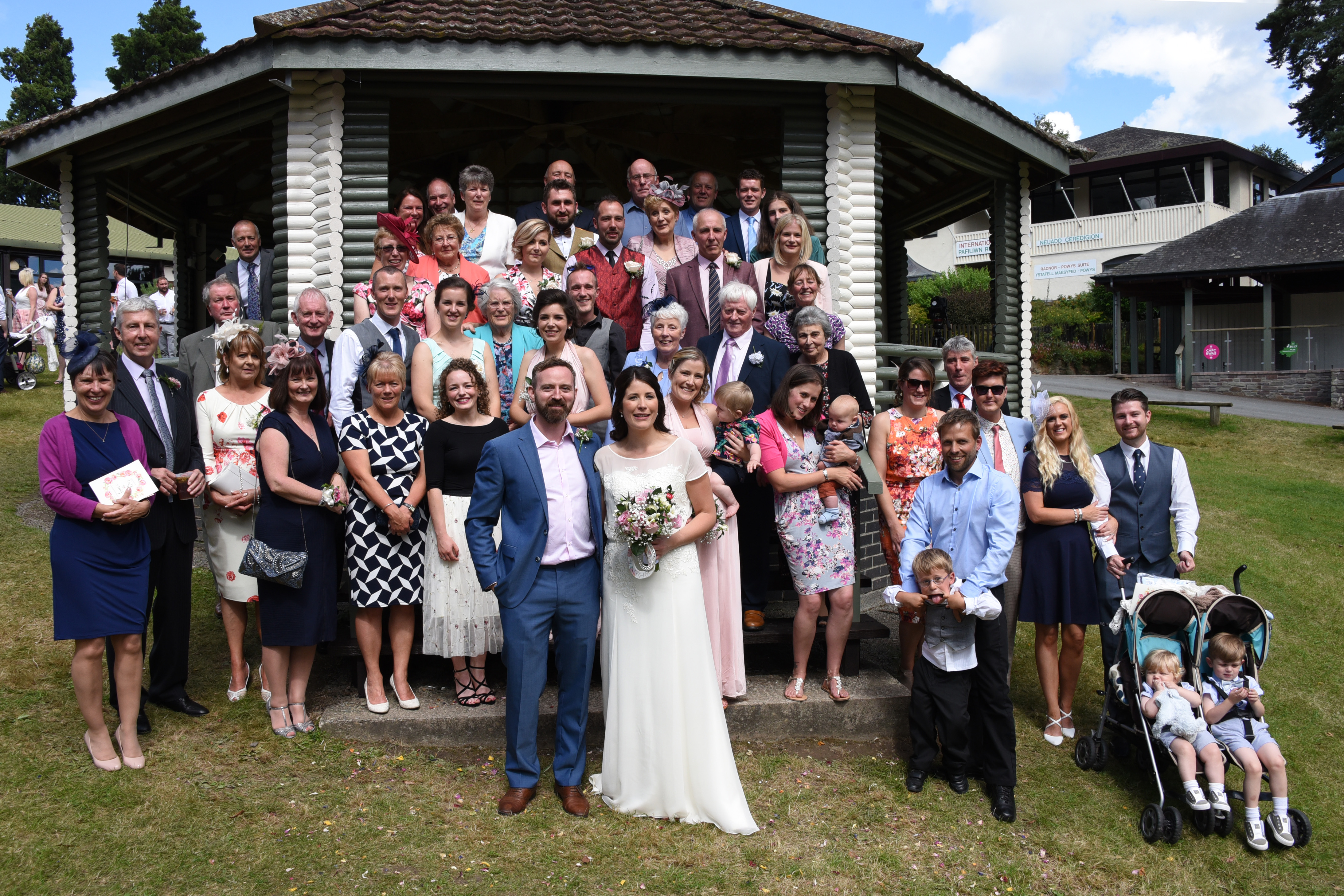 Wedding guests at The Bandstand, Royal Welsh Showground, showcasing outdoor event planning.