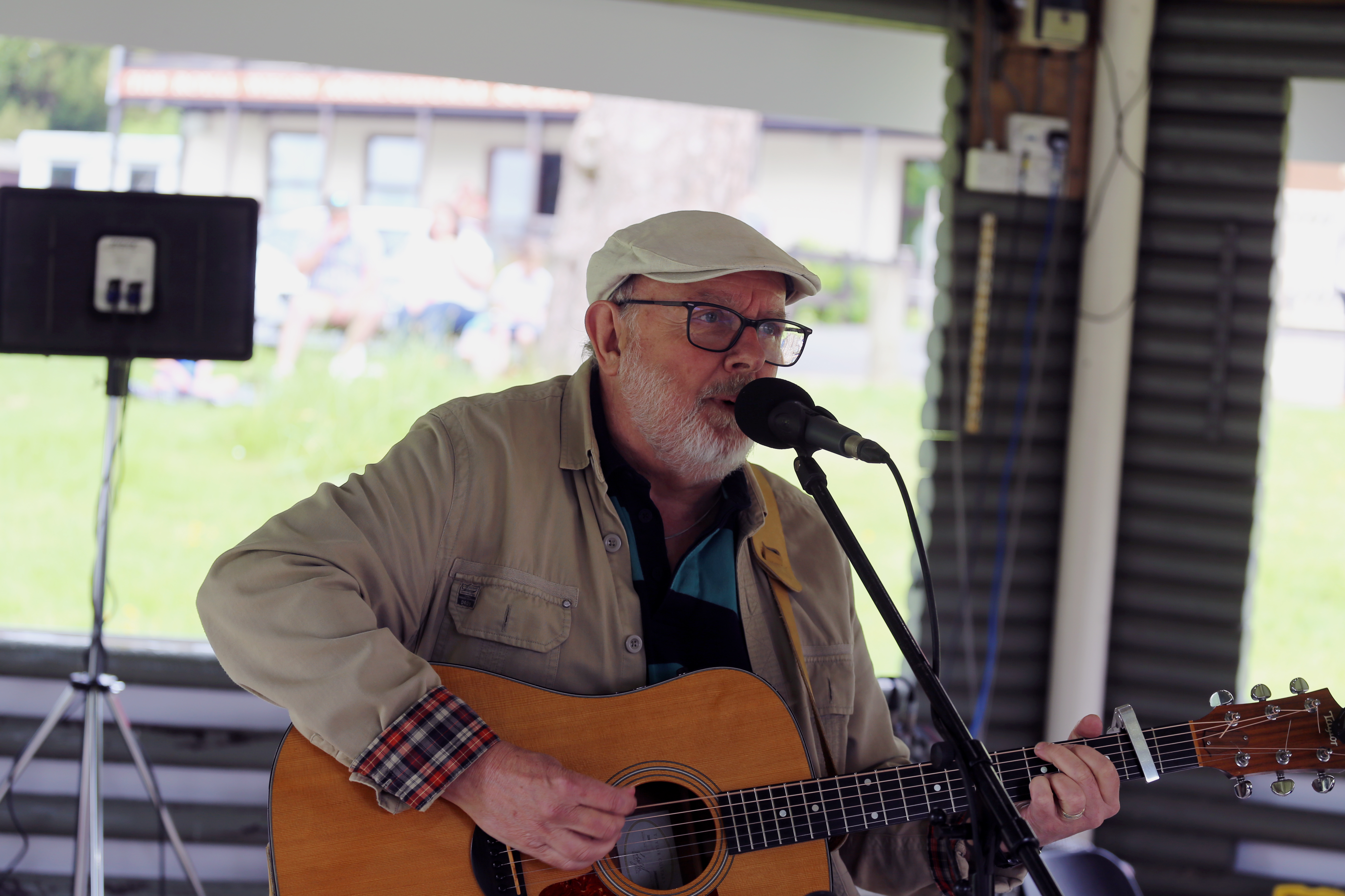 Live musician performing at The Bandstand, Royal Welsh Showground event.