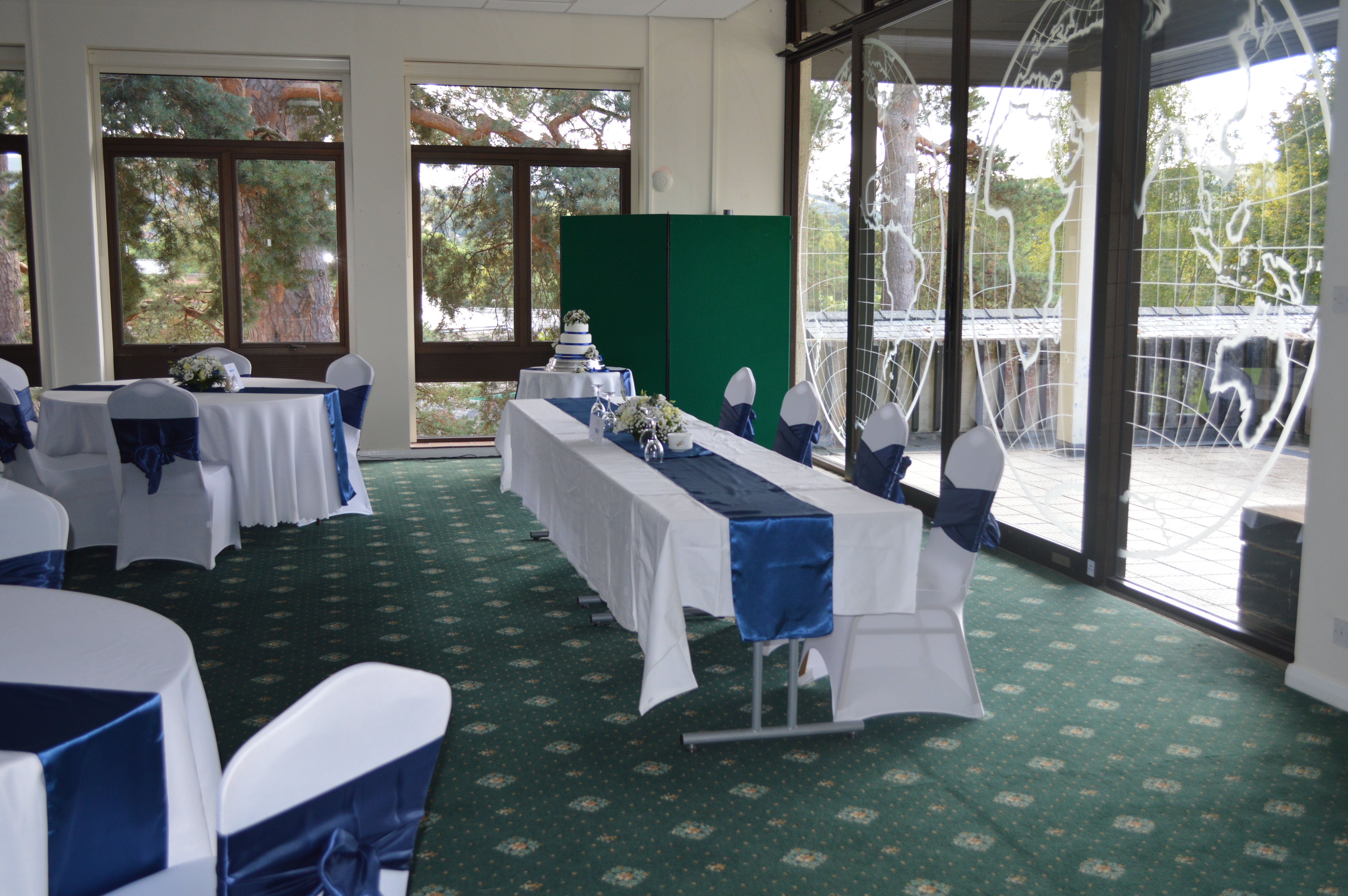 International Pavilion at Royal Welsh Showground, elegant wedding venue with blue accents.