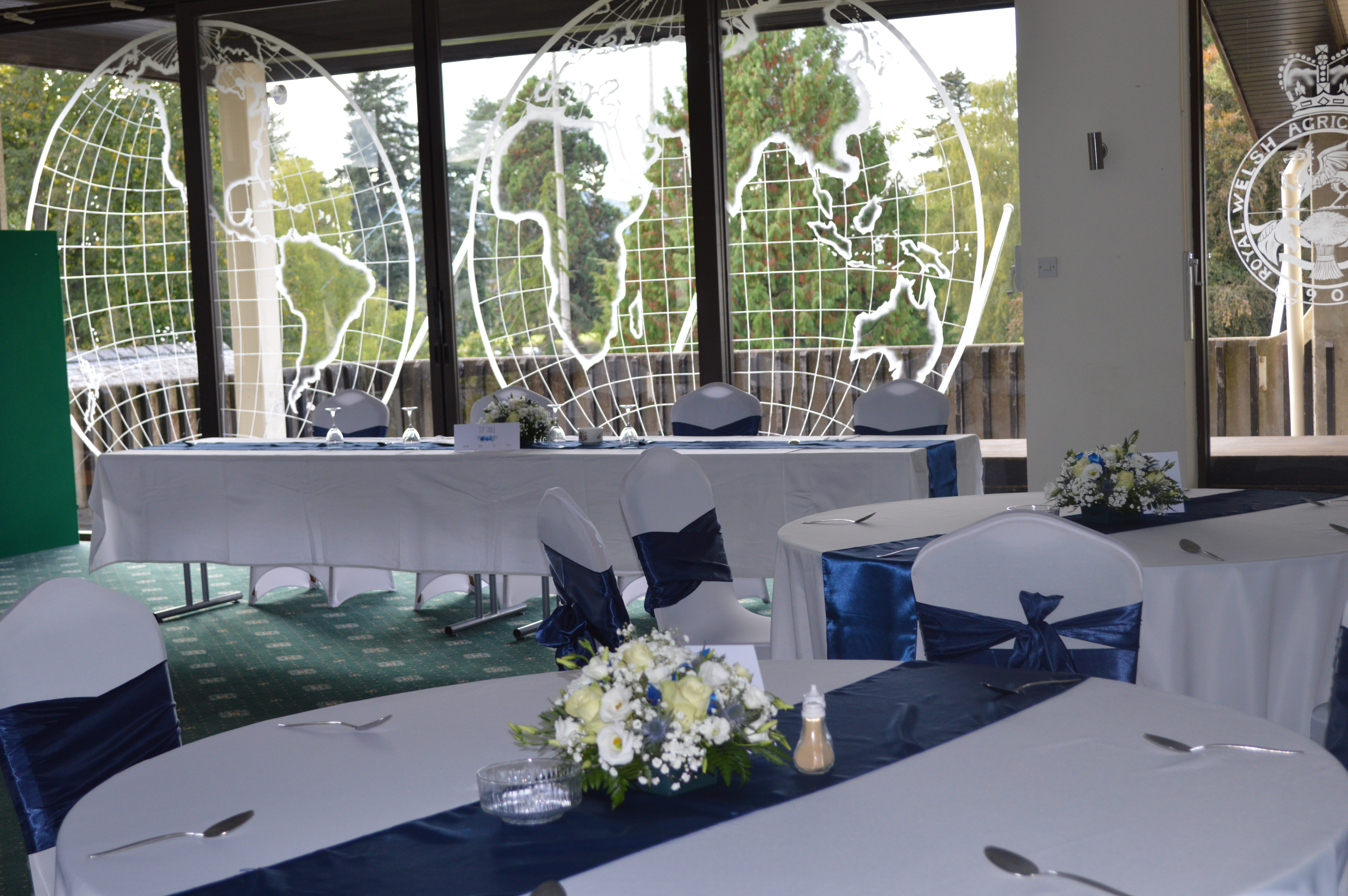 International Pavilion at Royal Welsh Showground, elegant tables for conferences and gatherings.