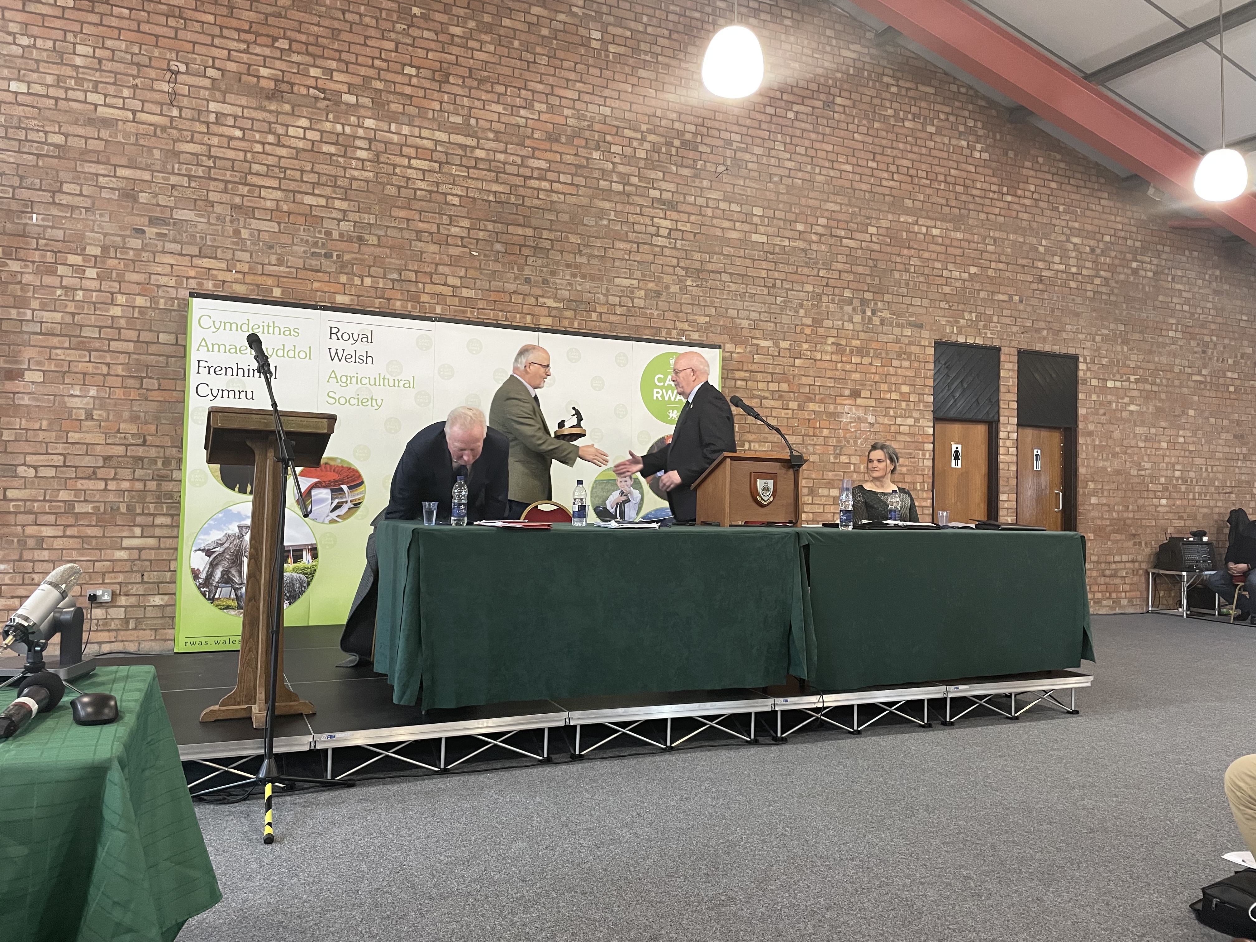 Montgomeryshire Pavilion at Royal Welsh Showground, podium setup for a professional conference.