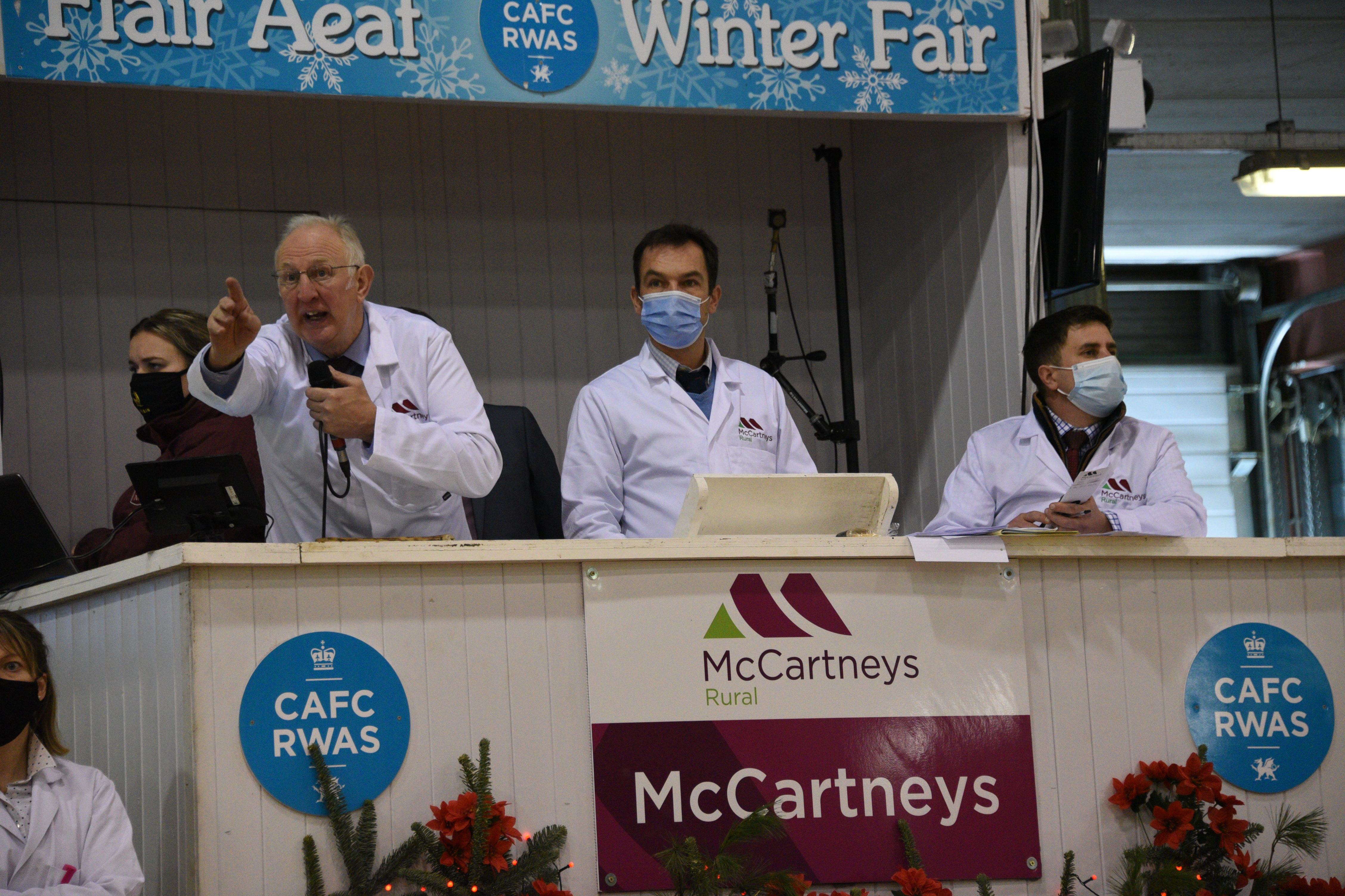 Auction event at Royal Welsh Showground with dynamic presenters and strong branding.