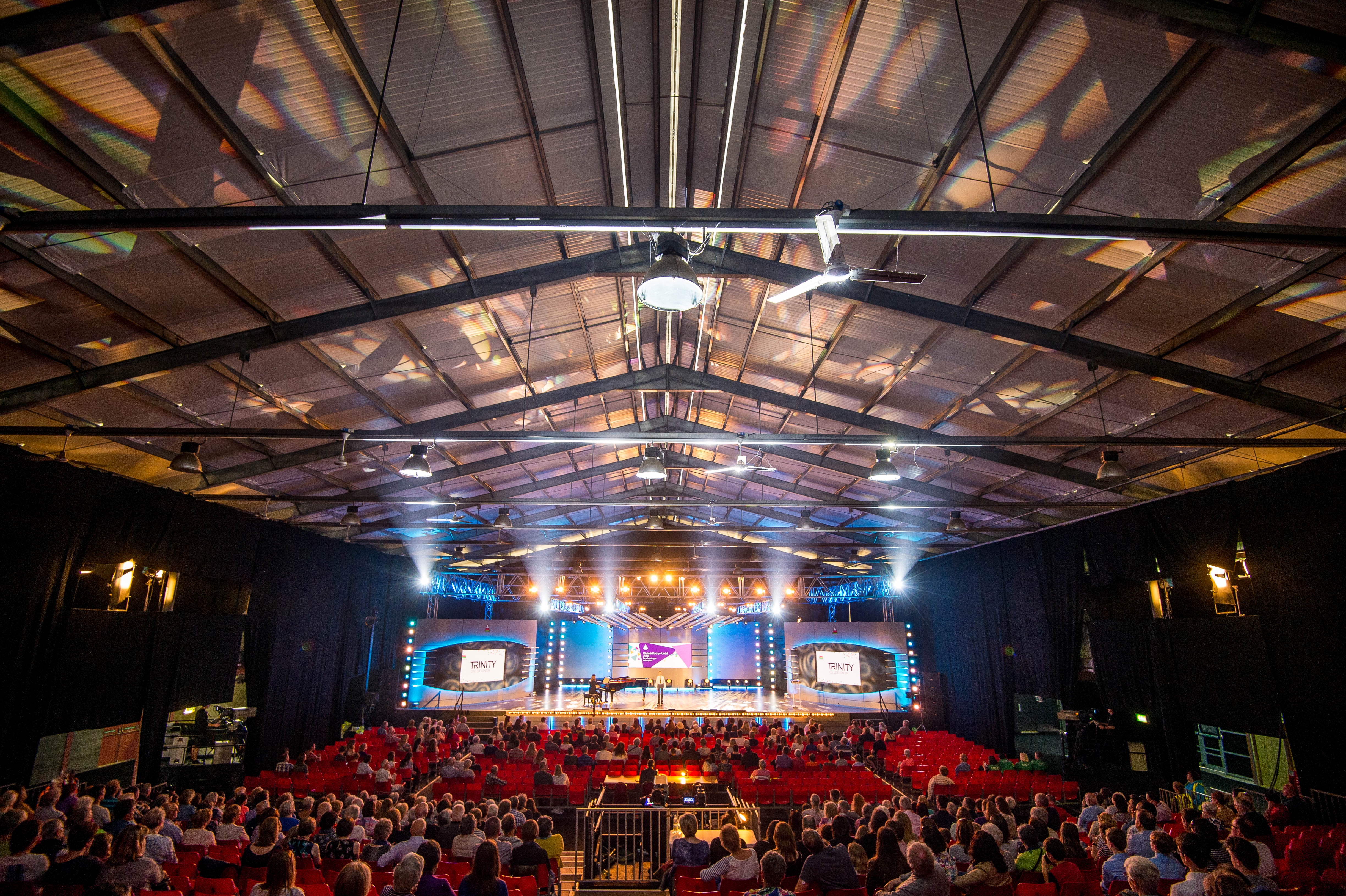 Exhibition Hall at Royal Welsh Showground, spacious venue for conferences and performances.