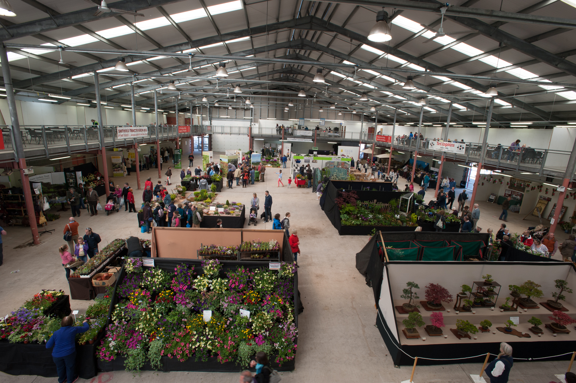 Exhibition Hall at Royal Welsh Showground during a vibrant gardening expo event.