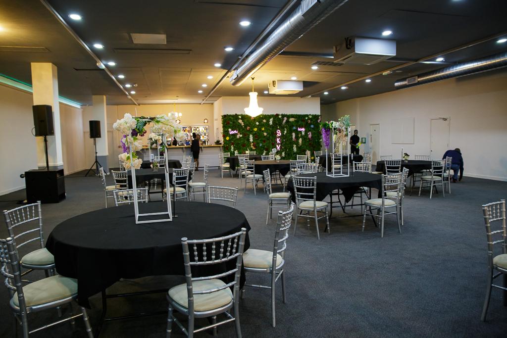 Sky Emerald Banqueting Suite with elegant round tables, ideal for weddings and conferences.