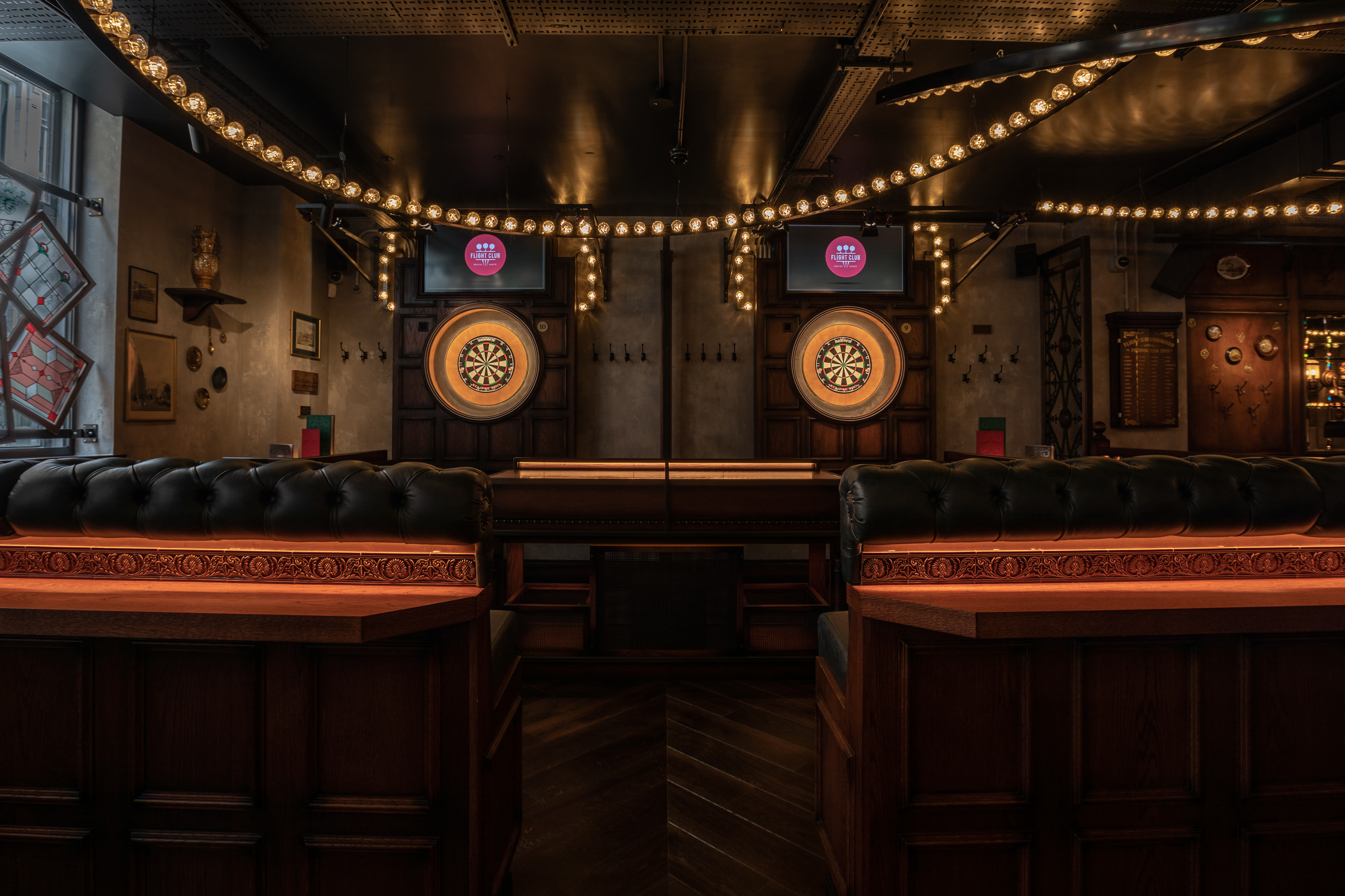 Stylish event space in Flight Club Birmingham with dartboards for networking and team-building.