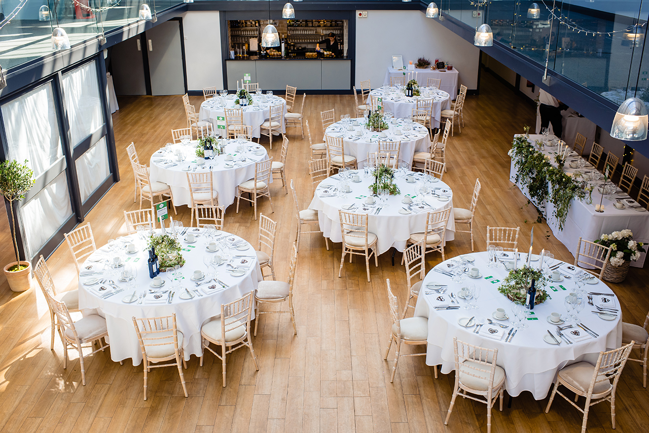 Elegant event space at Hatfield House with round tables, perfect for weddings and receptions.