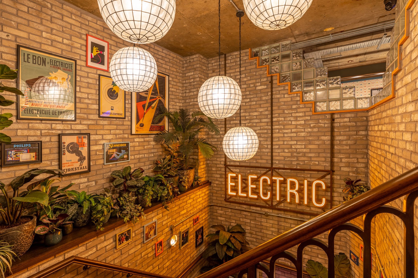 Vibrant Electric Shuffle Leeds venue with stylish staircase, perfect for events and meetings.