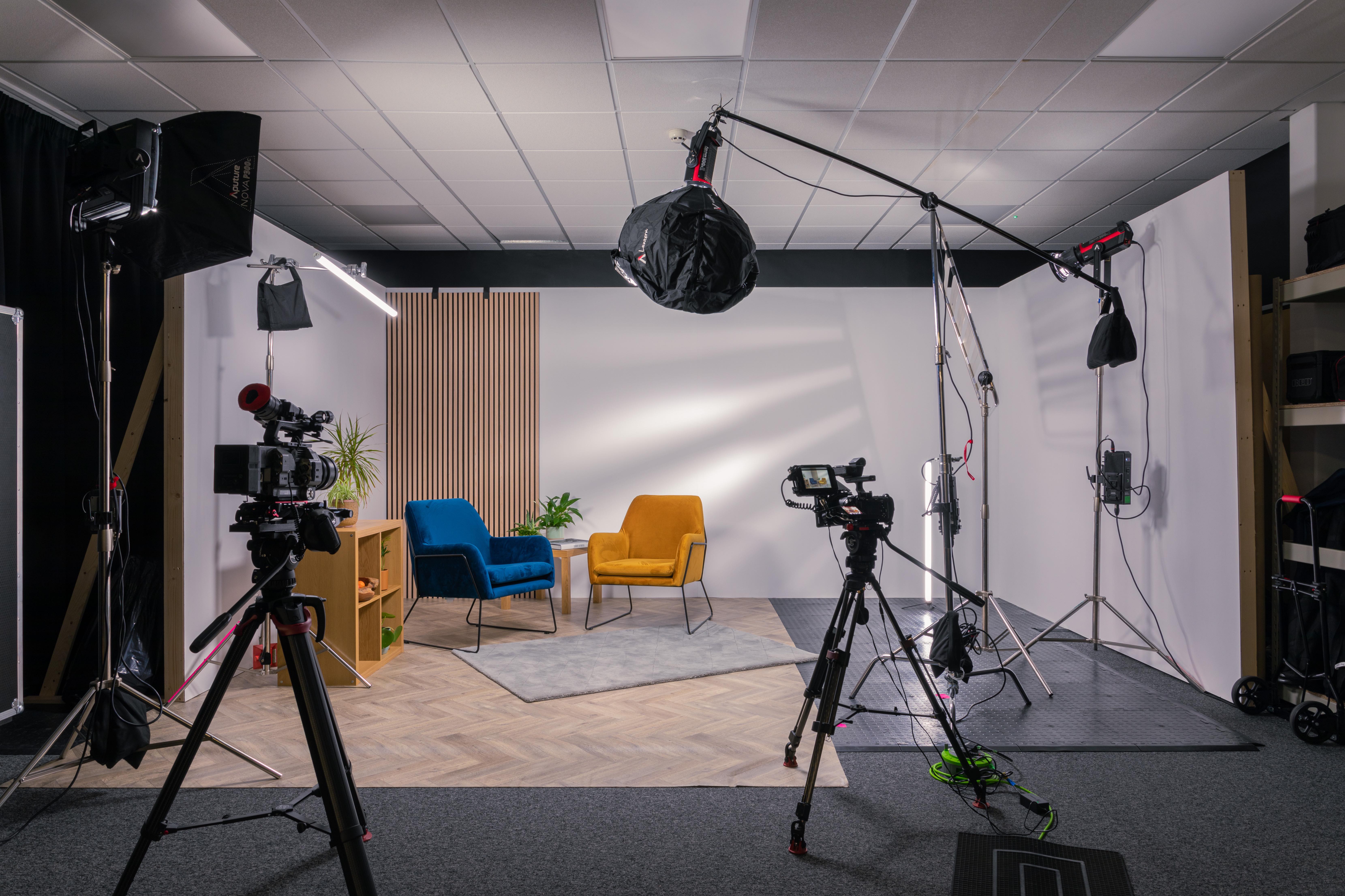 Sound & Colour Films Studio with colorful chairs for virtual meetings and live events.