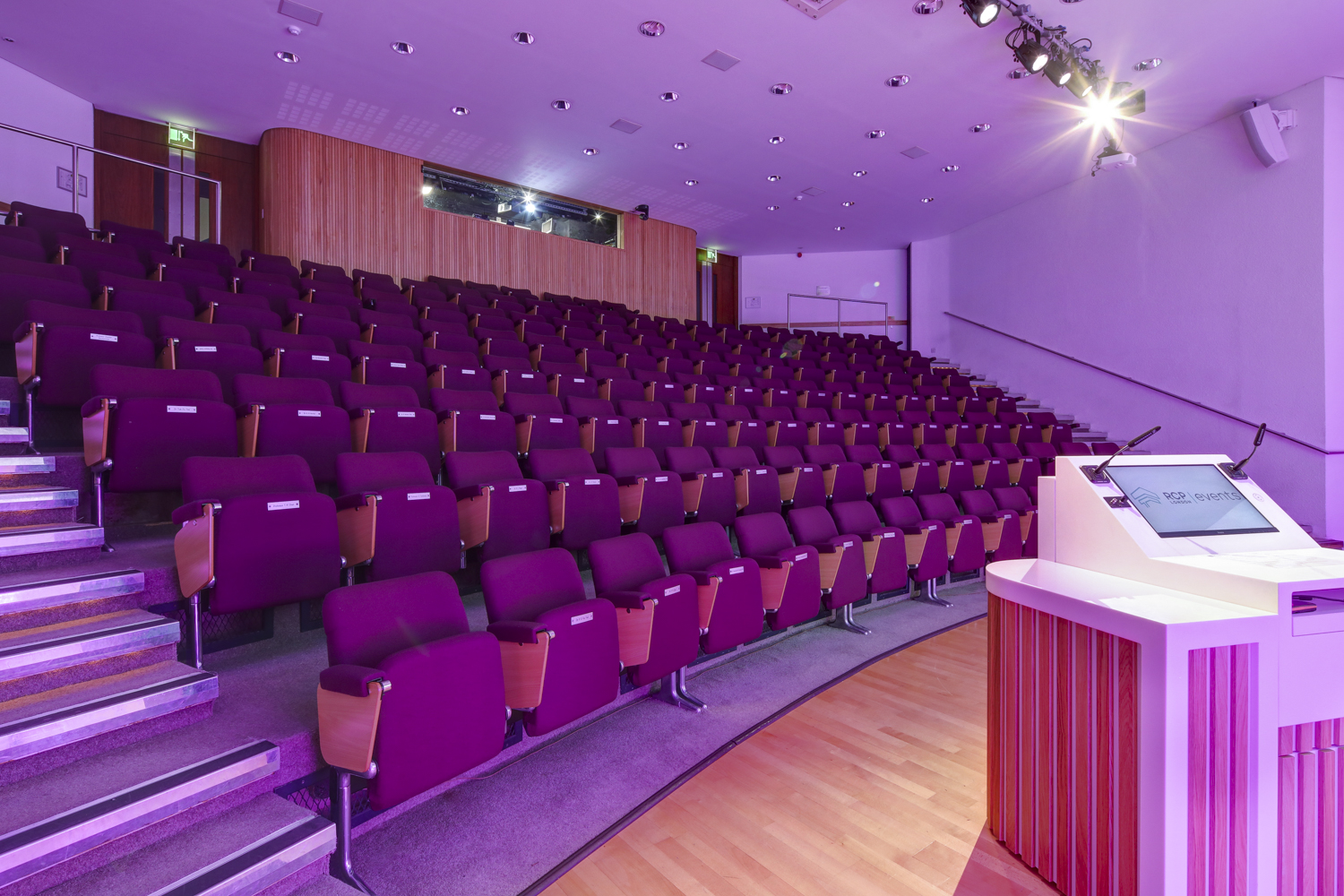 Seligman Theatre at RCP London, modern auditorium with purple tiered seating for events.