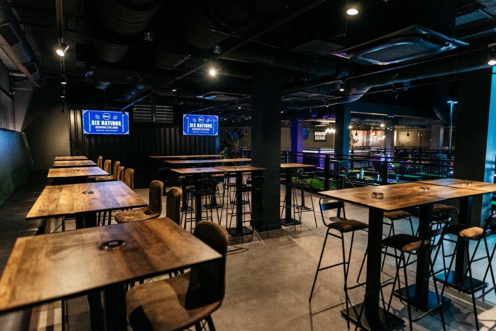 Modern event space in Par 59 Cardiff with high-top tables, ideal for networking events.