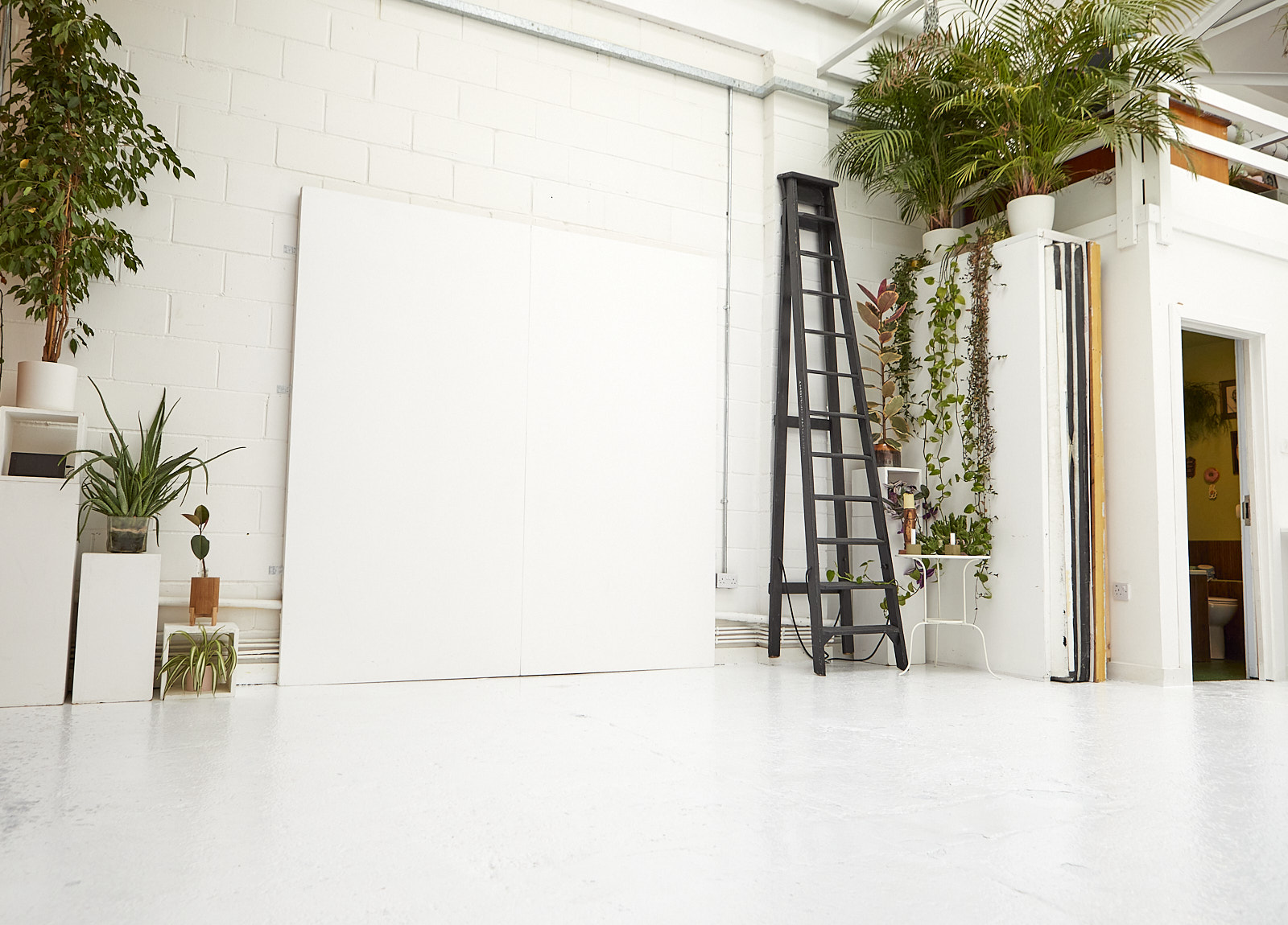 Versatile Peanut Factory Studio event space with natural light, ideal for workshops and meetings.