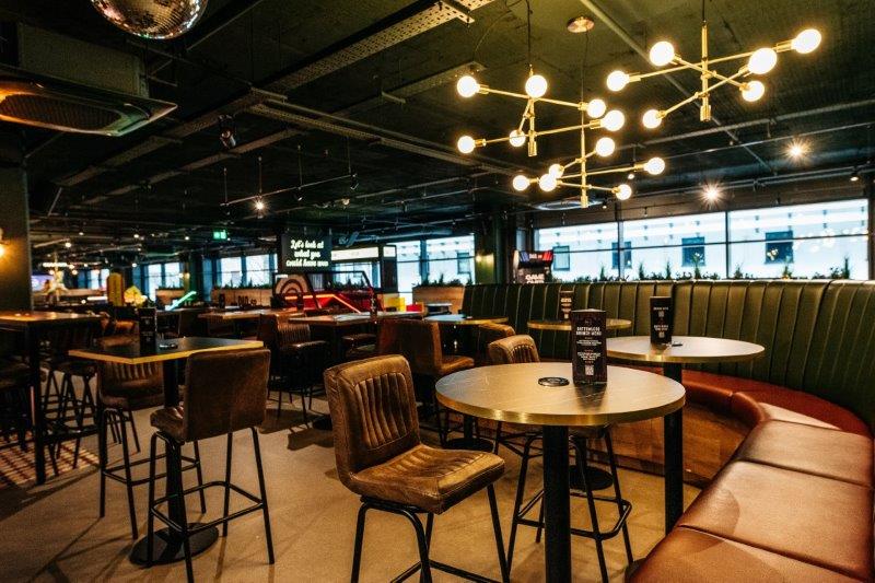 Modern event space in Par 59 Bristol with cozy seating for networking and meetings.