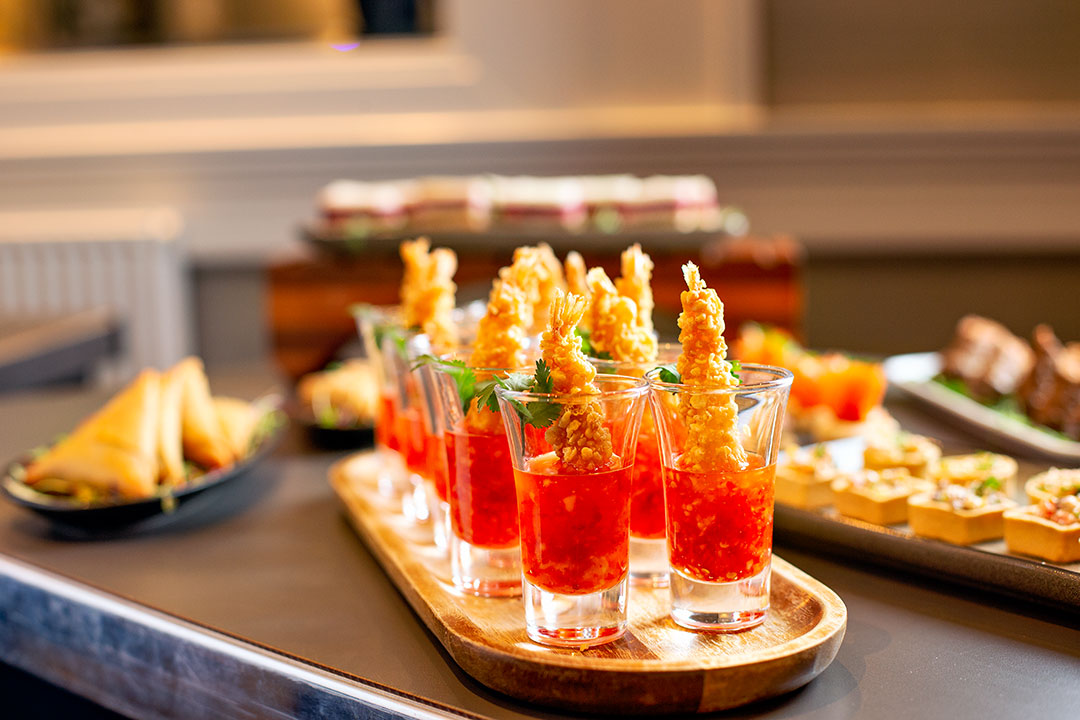 Ealing Suite appetizers with shrimp cocktails for networking events at DoubleTree Hilton.