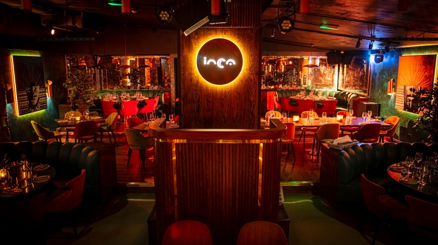 Vibrant Inca restaurant with colorful seating, perfect for events and gatherings.