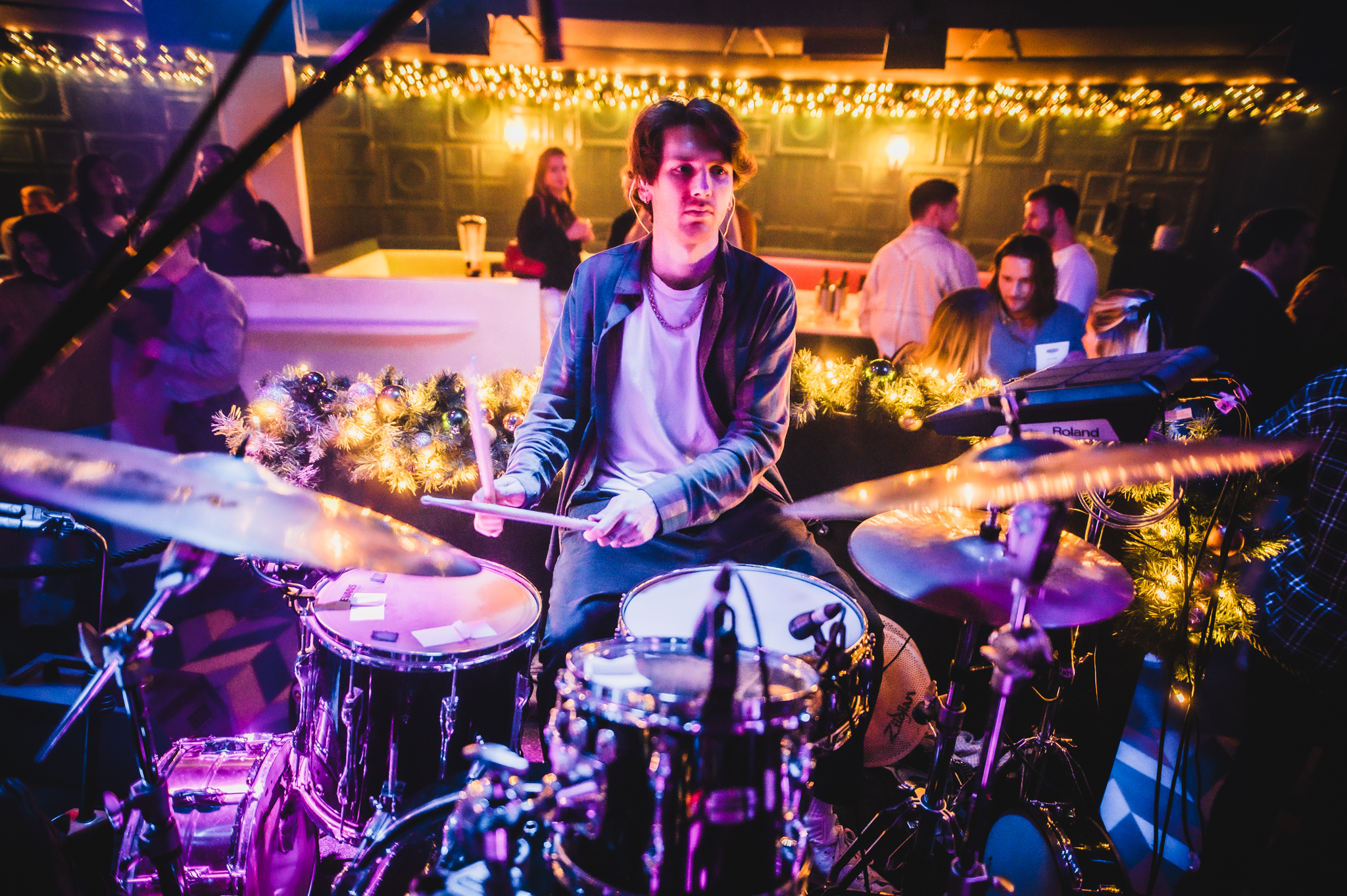 Vibrant event at The Piano Works Farringdon with live drummer, perfect for networking.