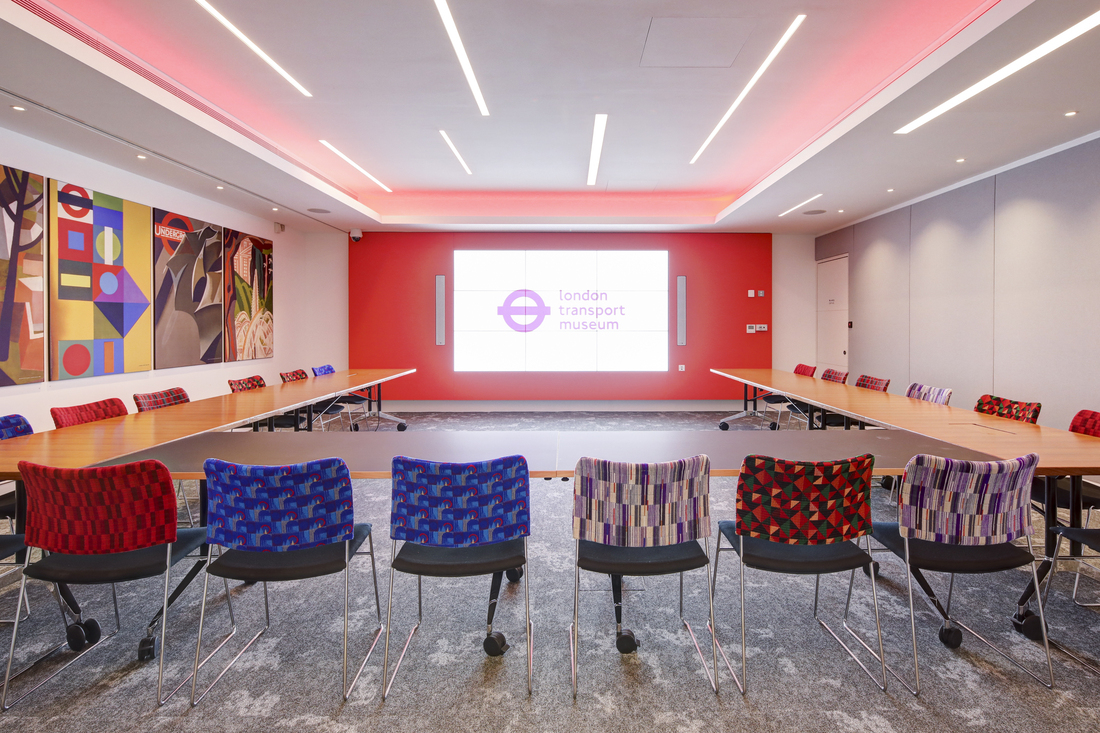 Cubic Boardroom at London Transport Museum, modern meeting room with vibrant seating.