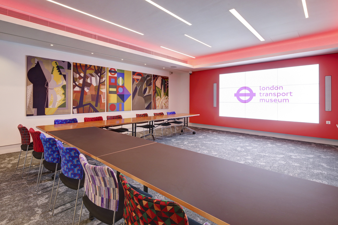 Cubic Boardroom at London Transport Museum, modern meeting space with vibrant artwork.