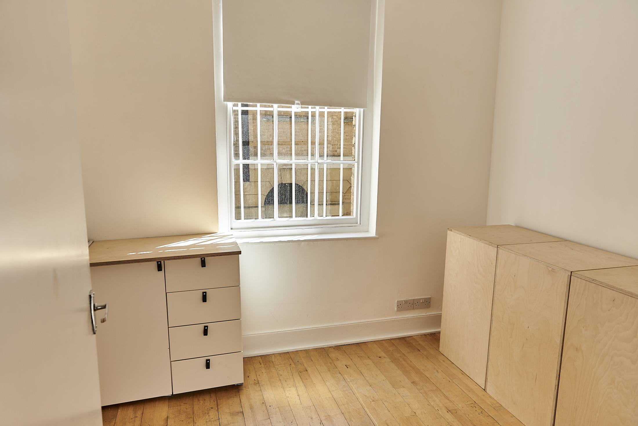 Minimalist event space at 67 York Street Gallery, perfect for meetings and gatherings.