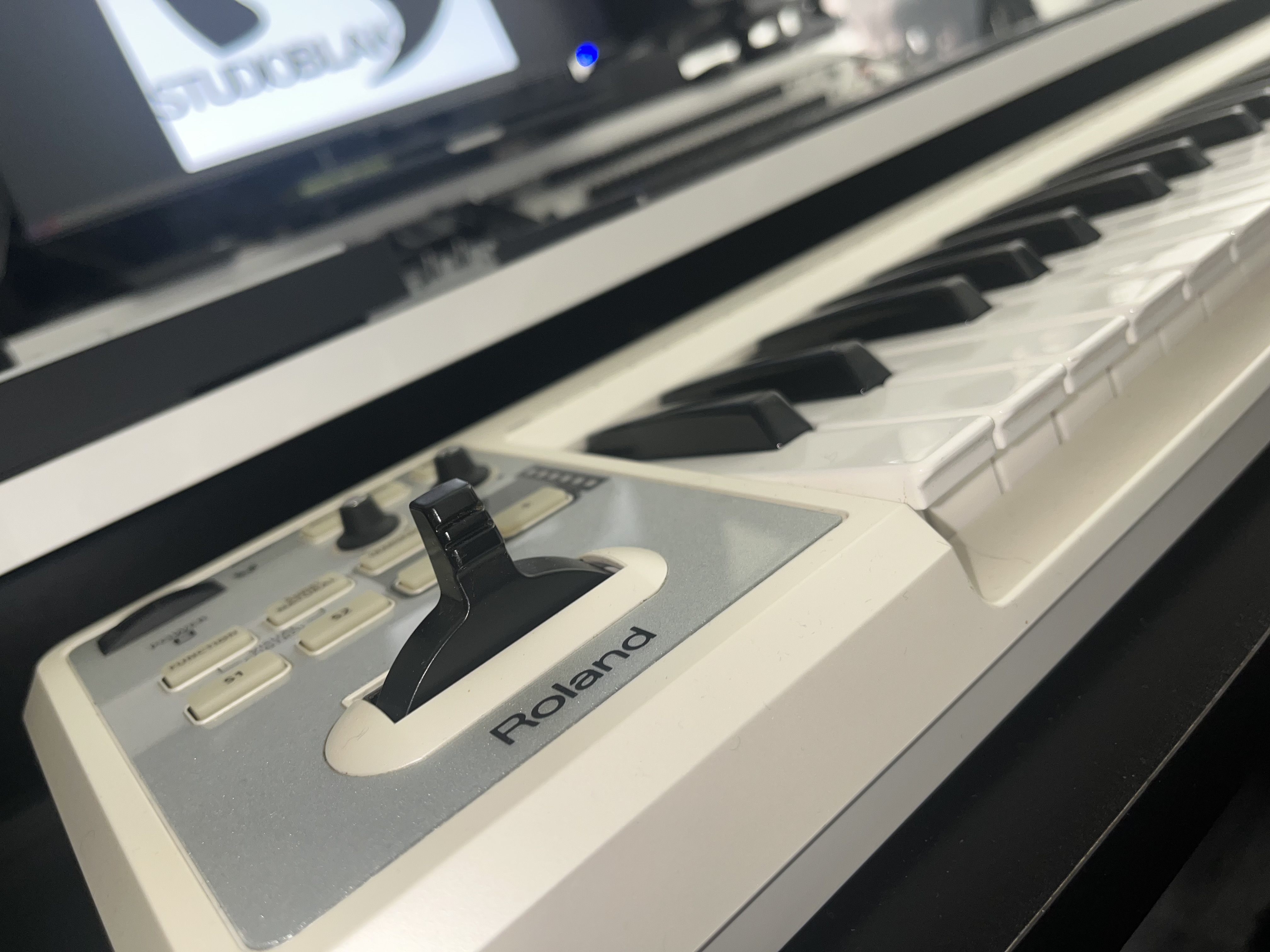 Close-up of a sleek Roland keyboard for engaging events and presentations.