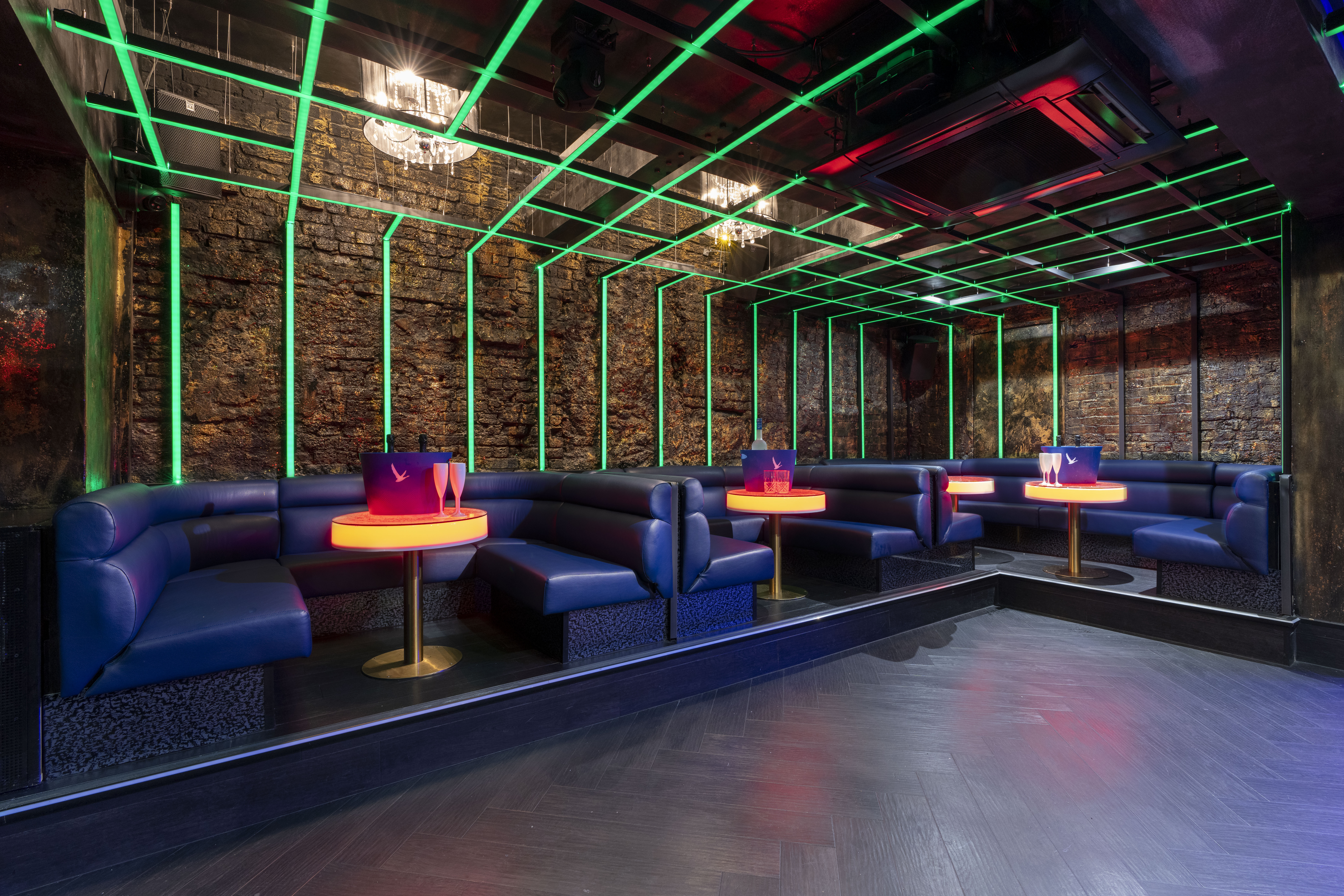 VIP Lounge in Zebrano Soho with neon lighting, perfect for networking events and private parties.
