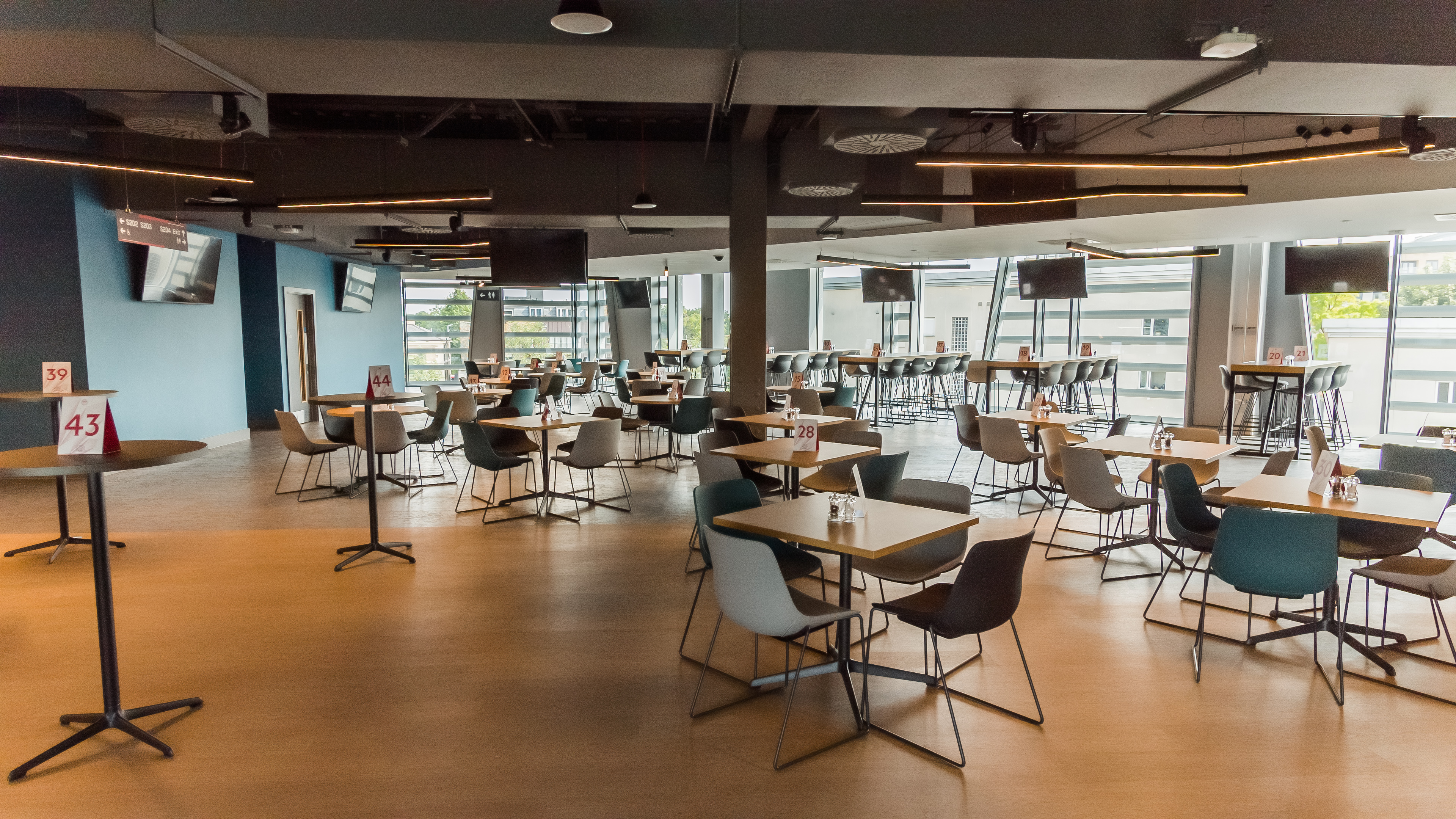 Legends Suite at Brentford FC: versatile event space with natural light for meetings and gatherings.