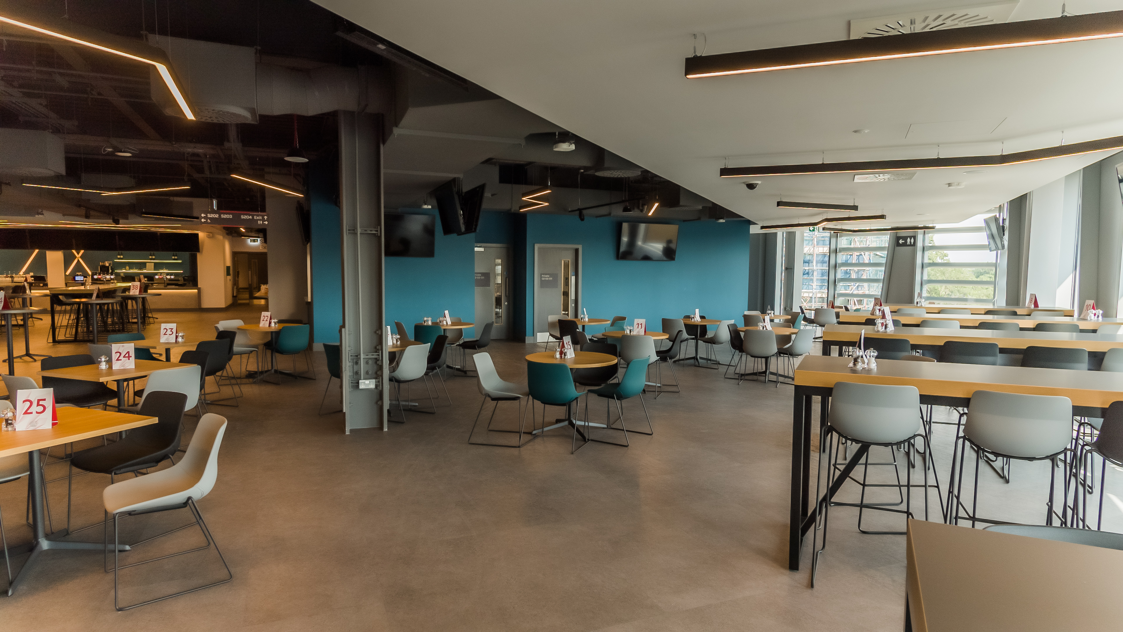 Legends Suite at Brentford FC: modern event venue with flexible seating for meetings and workshops.