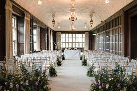Elegant Fanhams Hall event space with floral decor, perfect for weddings and gatherings.