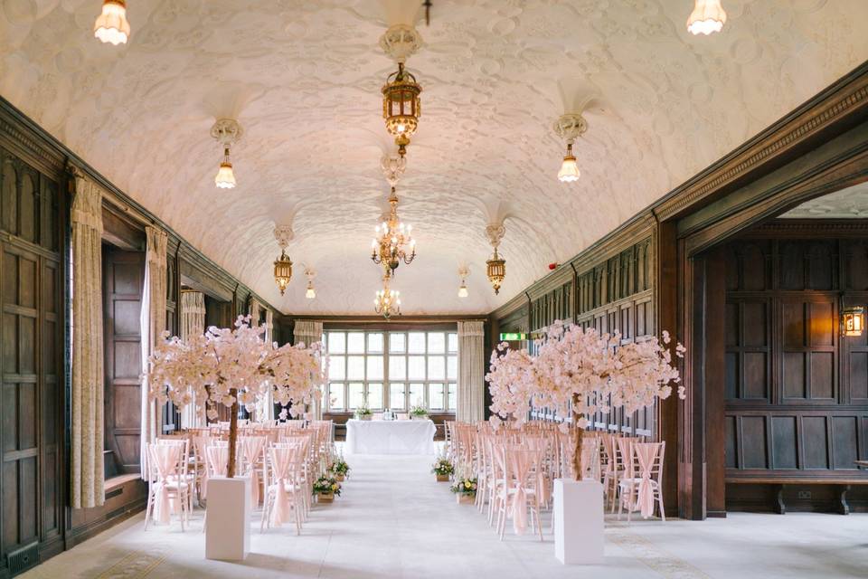 Elegant Fanhams Hall event space with floral decor, perfect for weddings and gatherings.