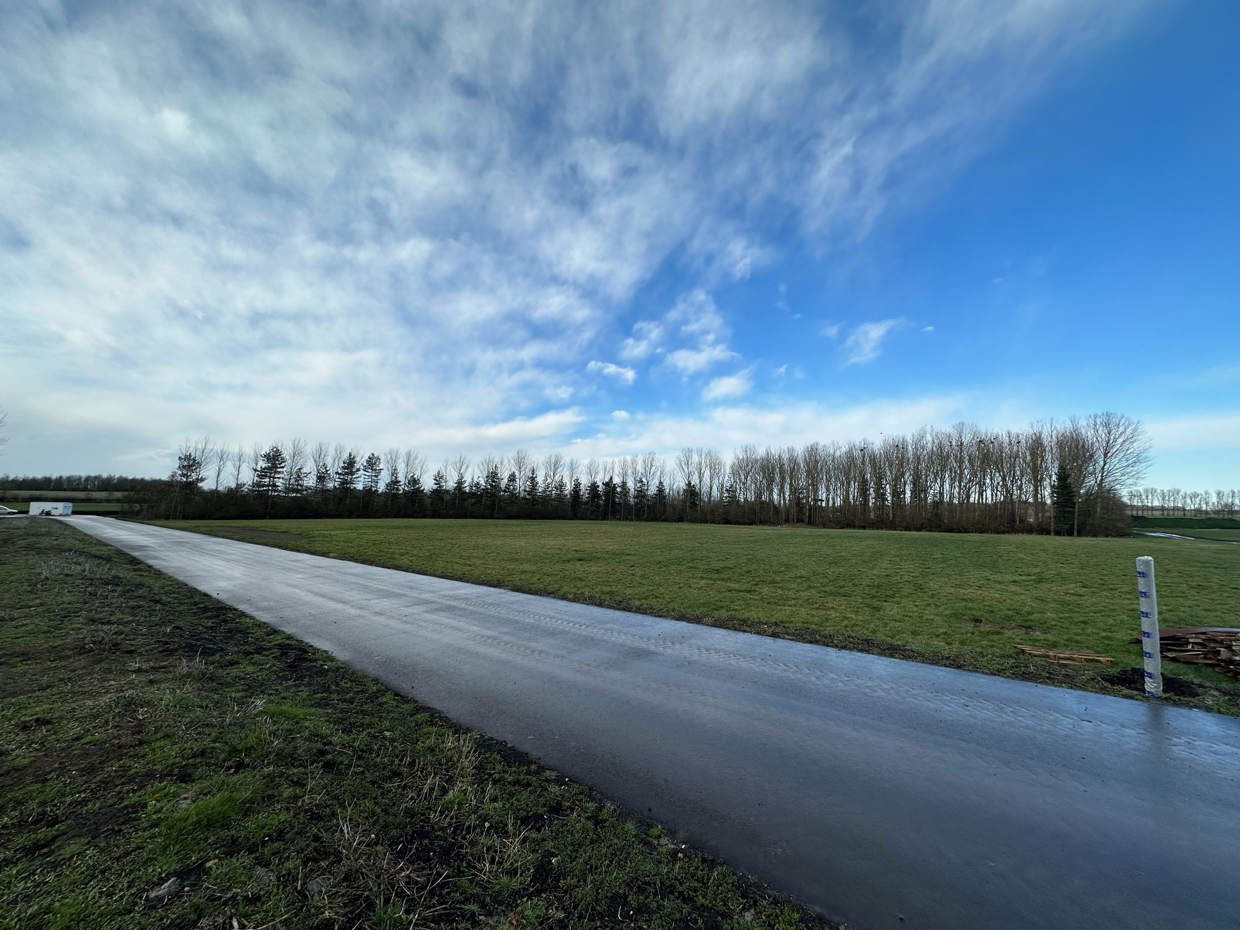 Stuntney Estate outdoor venue with paved road, ideal for corporate retreats and events.