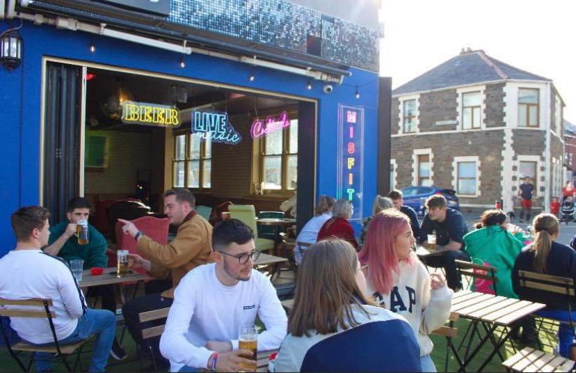 Vibrant outdoor venue at Misfits Social Club, ideal for casual networking events.