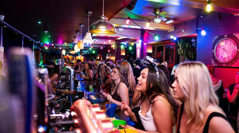 Vibrant Misfits Social Club bar scene, perfect for networking and social gatherings.