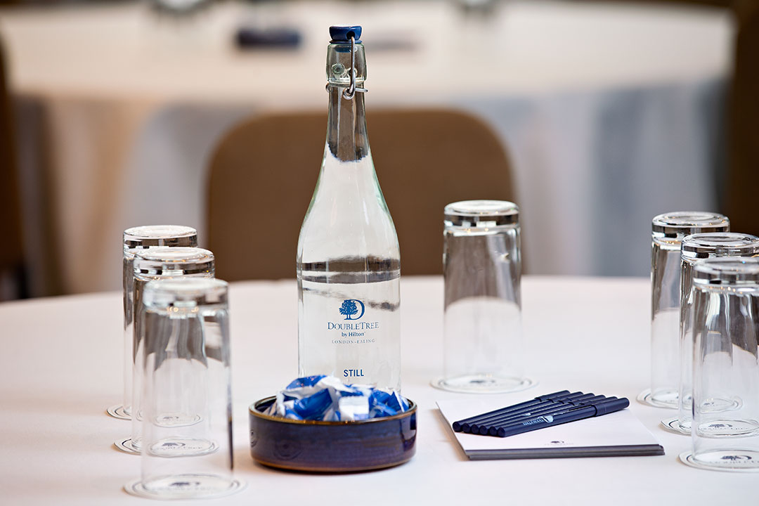 Springfield Suite meeting room at DoubleTree London Ealing with elegant table setup.
