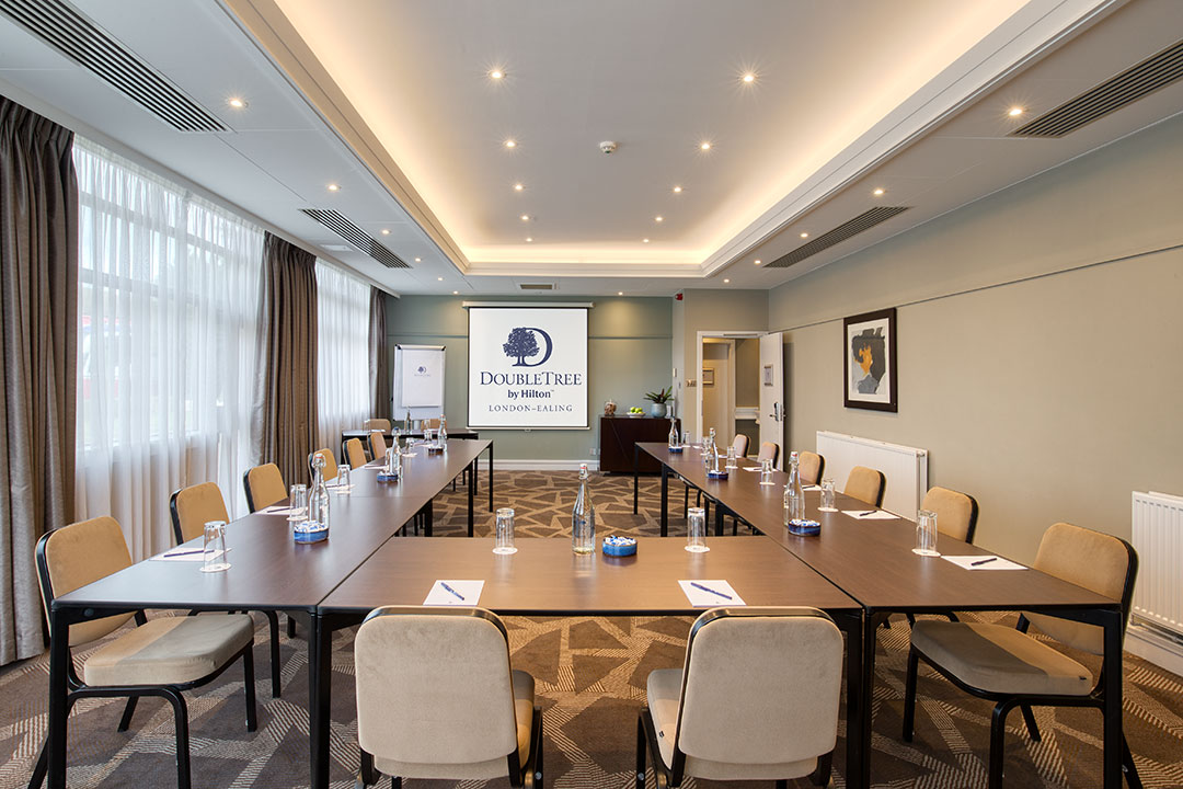 Springfield Suite meeting room with U-shaped table, ideal for corporate events and workshops.
