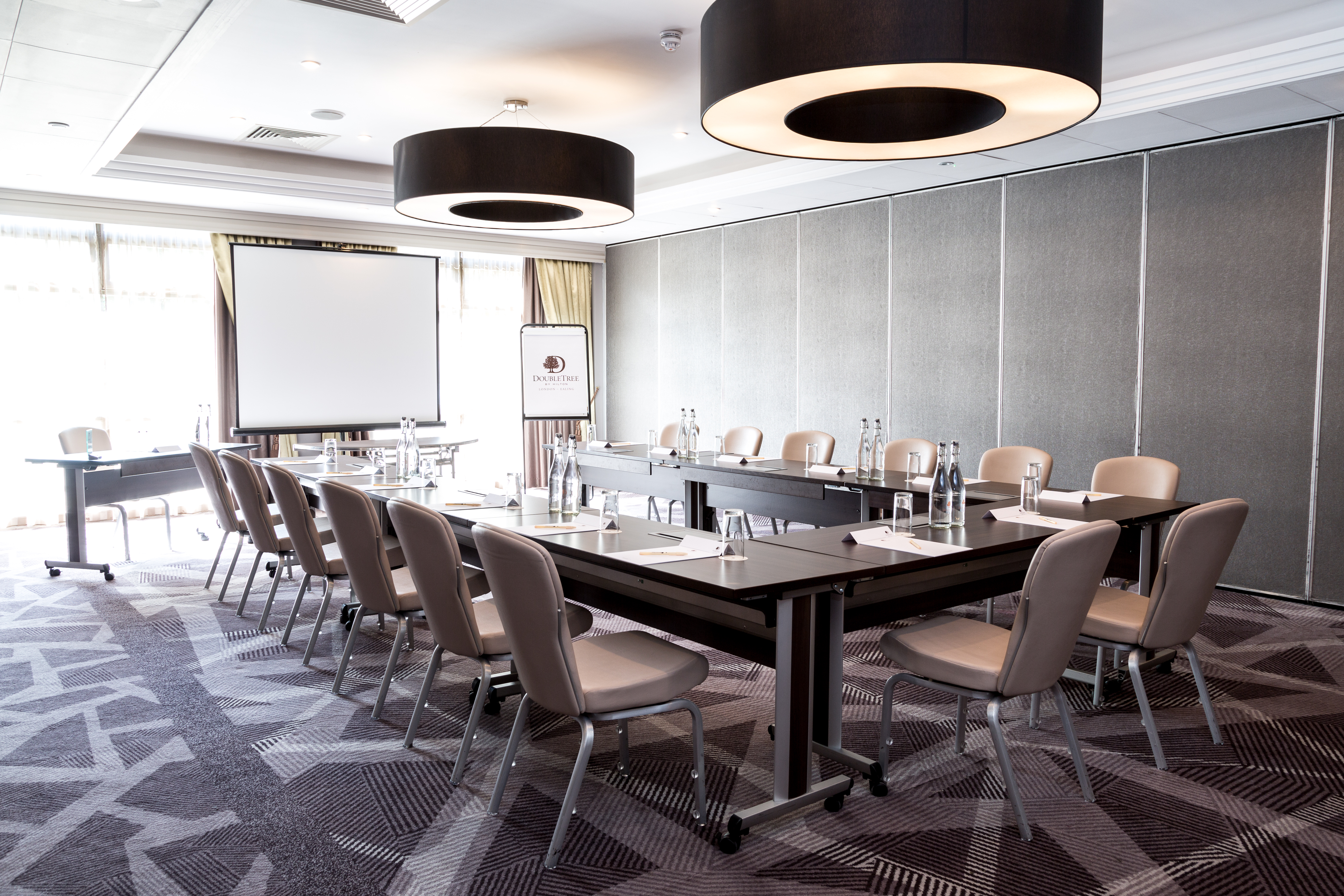 Byron Suite meeting room with natural light, ideal for corporate events and workshops.
