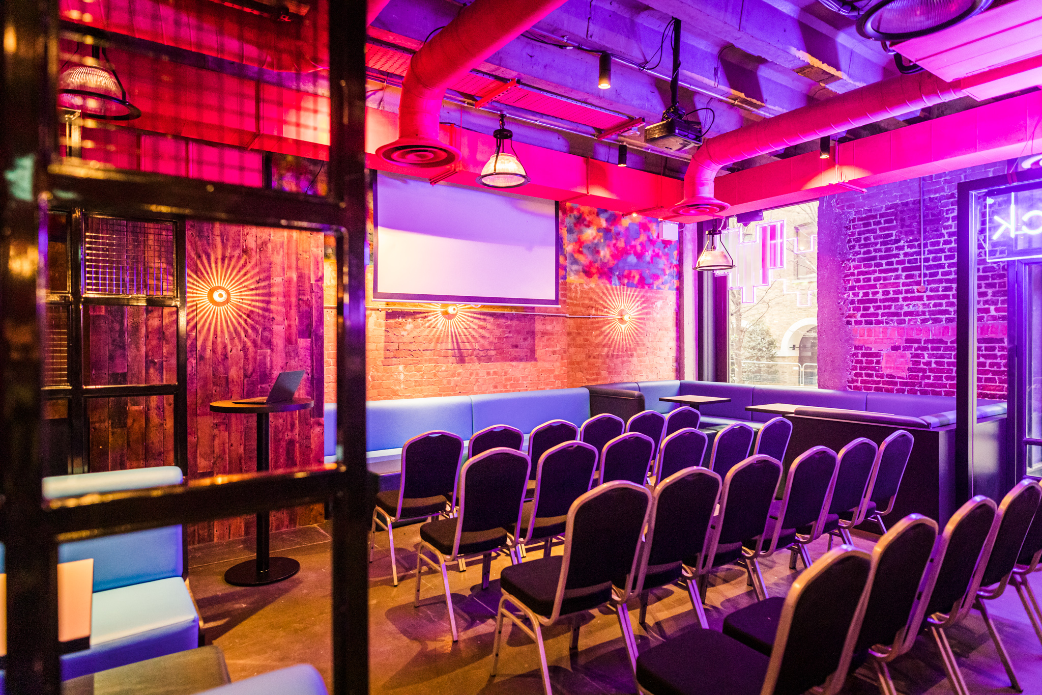 Vibrant event space at Lucky Voice Liverpool Street for dynamic workshops and seminars.