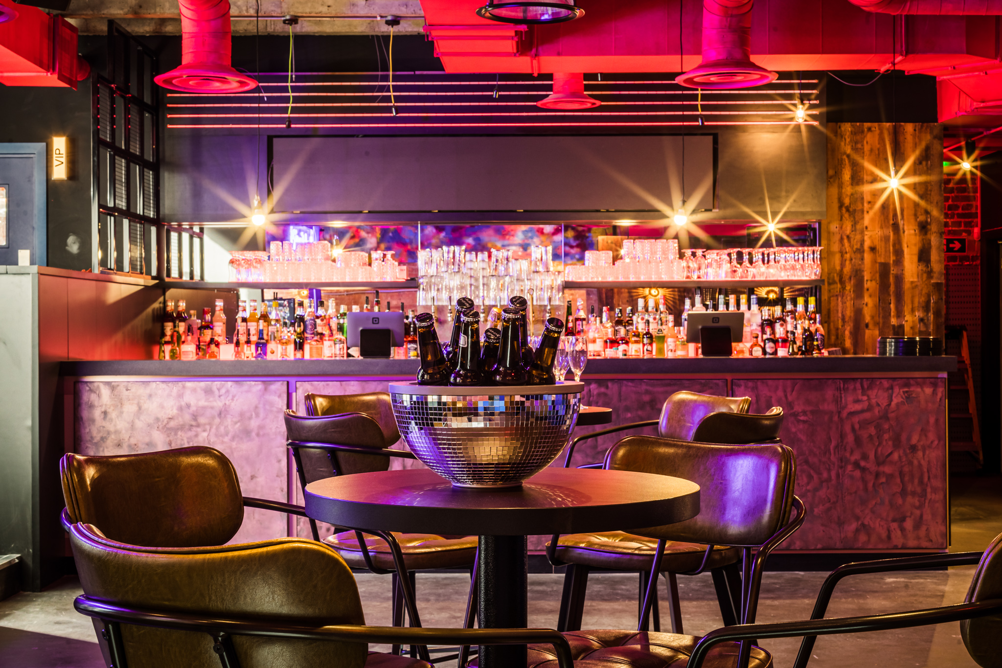 Stylish bar venue at Lucky Voice Liverpool Street, ideal for networking events and social gatherings.