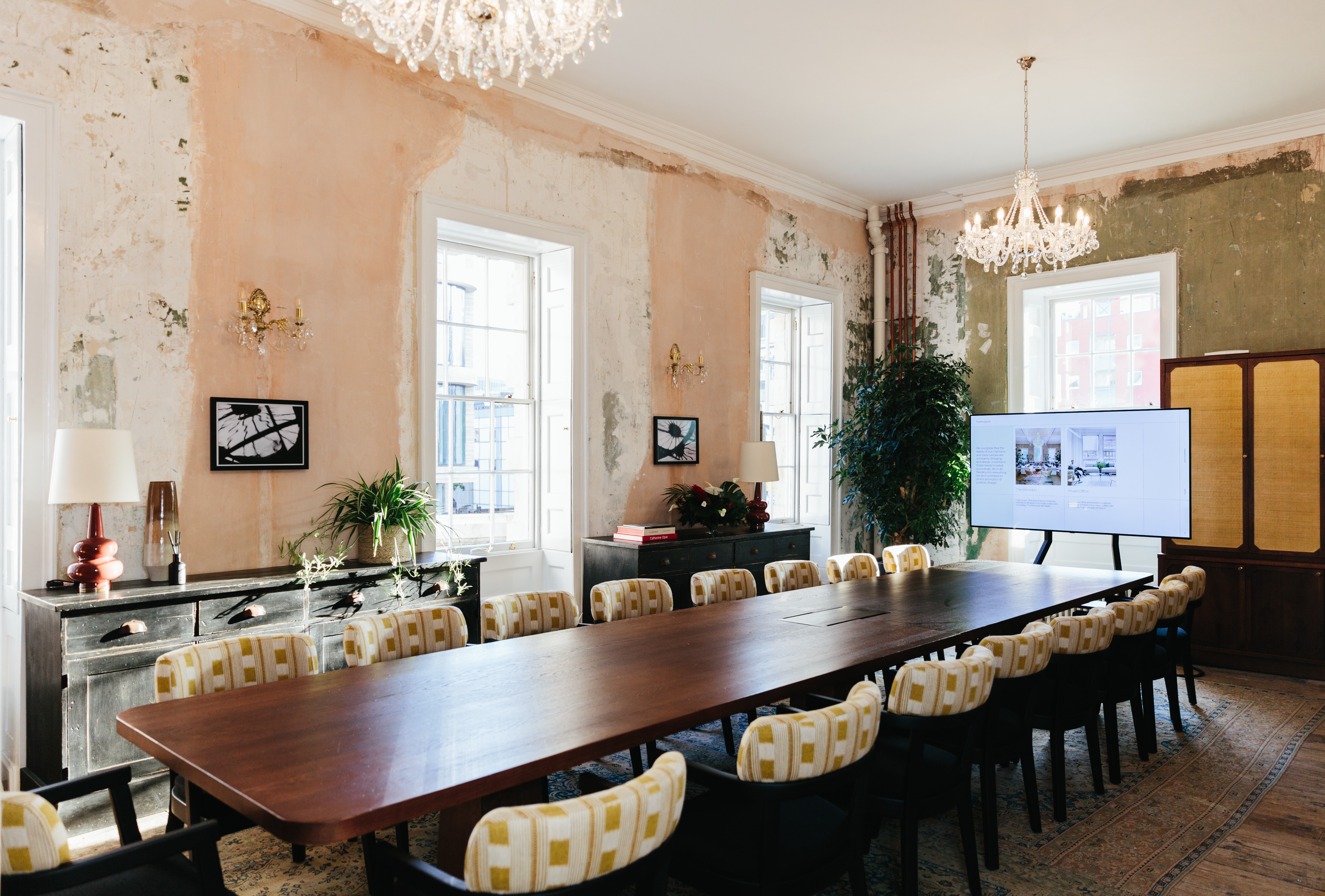 Chairman's Room at Knotel Workclub: rustic meeting space with modern amenities for events.