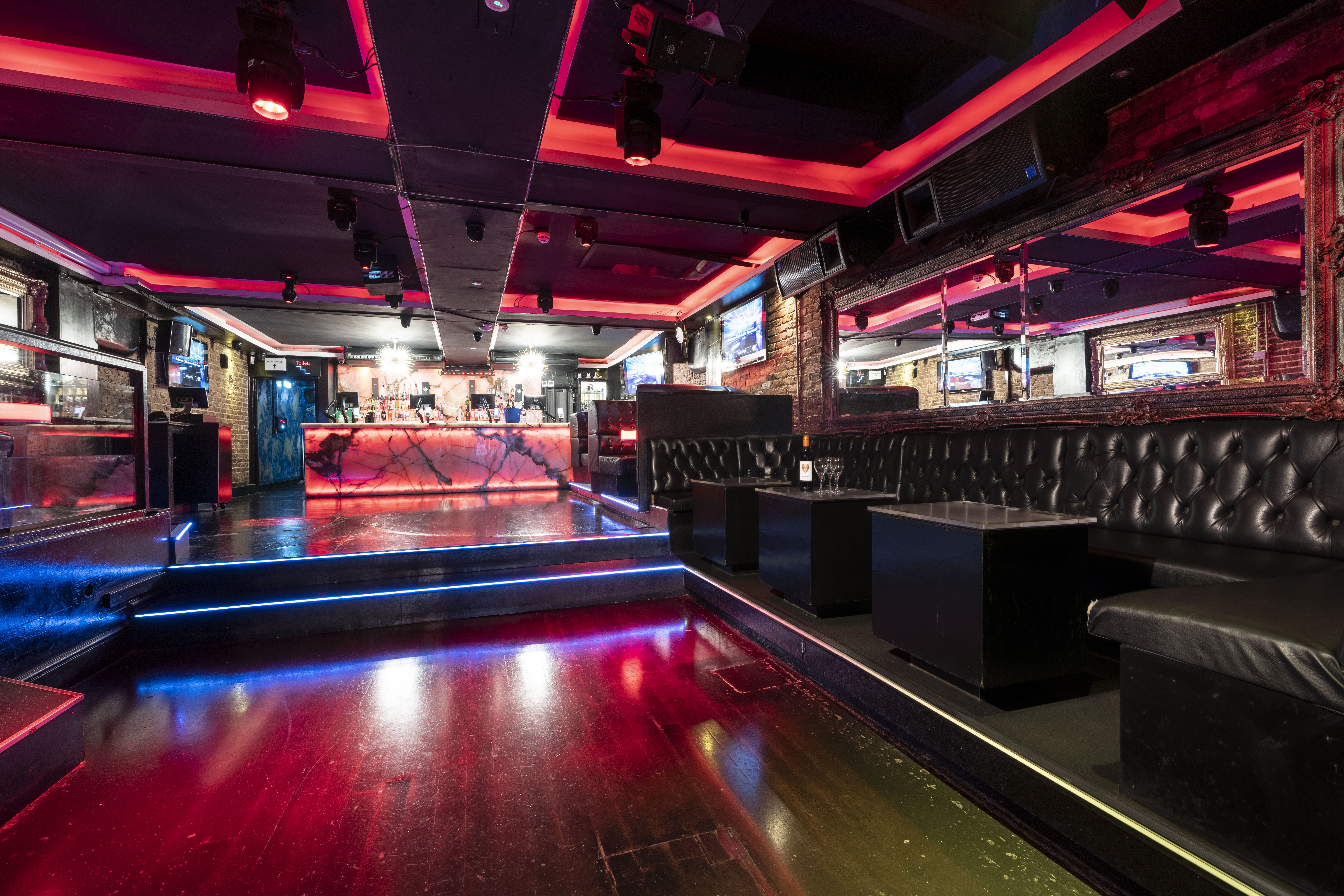 Modern event space in Zebrano Soho with vibrant lighting for parties and networking.