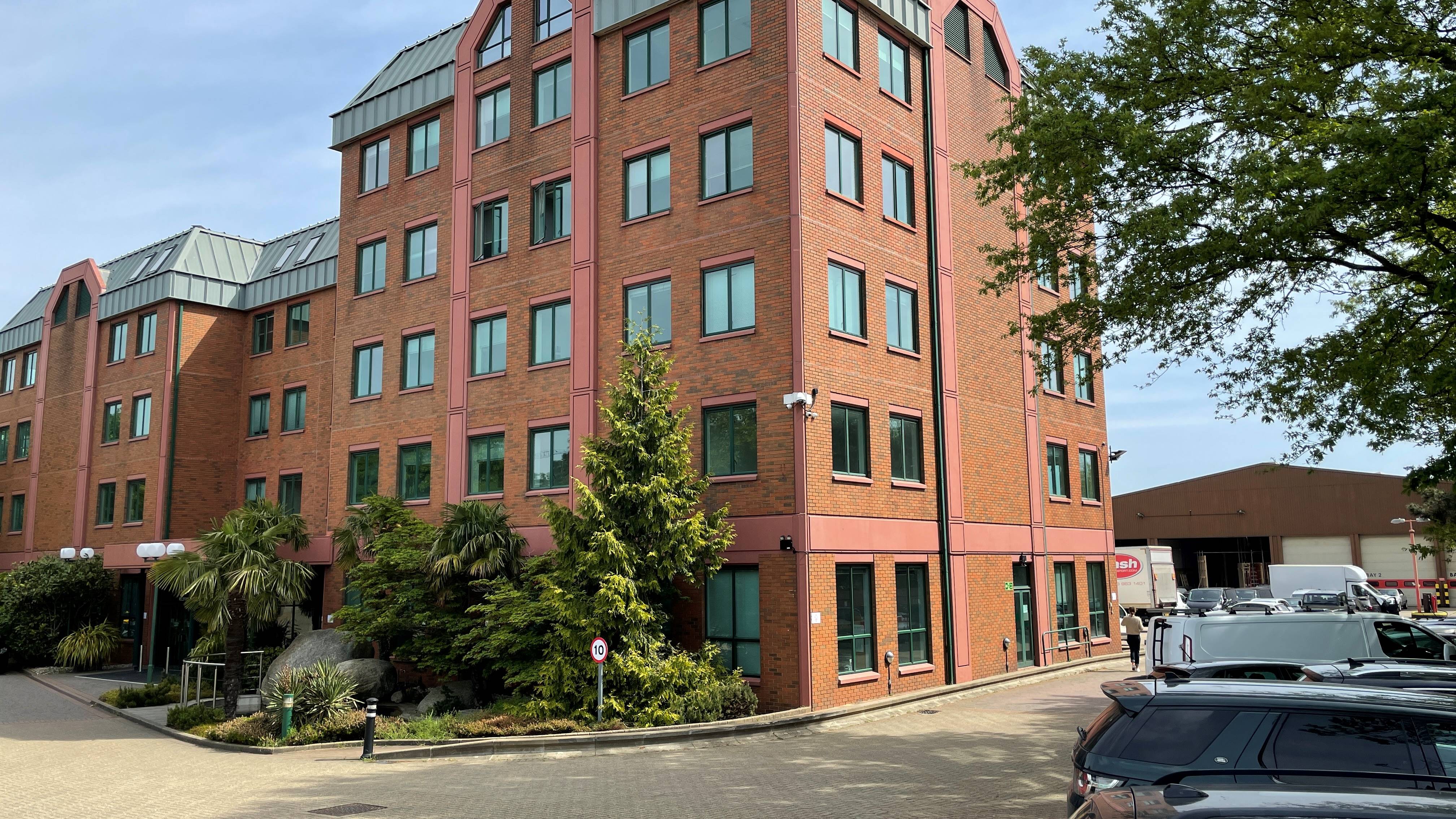 Modern Dinning Hall at London North Studios, ideal for events with natural light and greenery.