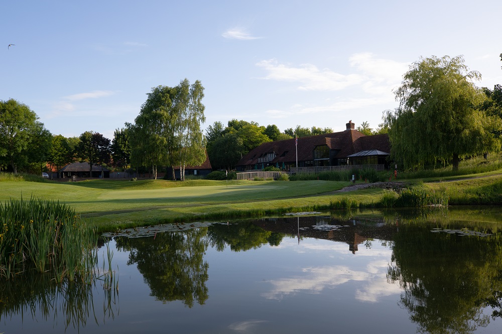 Lakeside at South Winchester Golf Club, serene pond for corporate retreats and outdoor events.